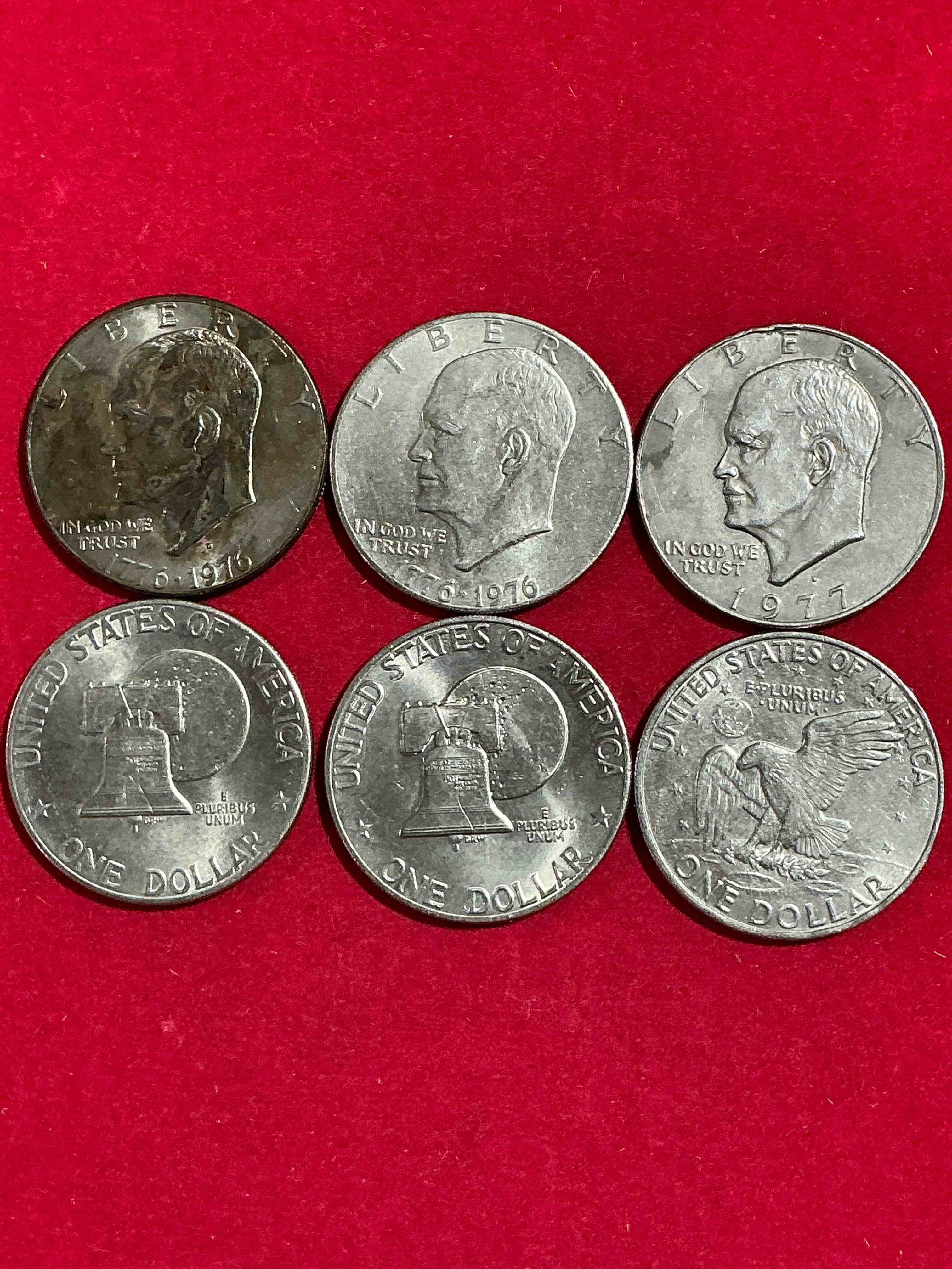 eisenhower dollars! here’s six circulated “ike” dollars! up for auction are ike one dollar coins from different years! 1976! awesome ike dollars!