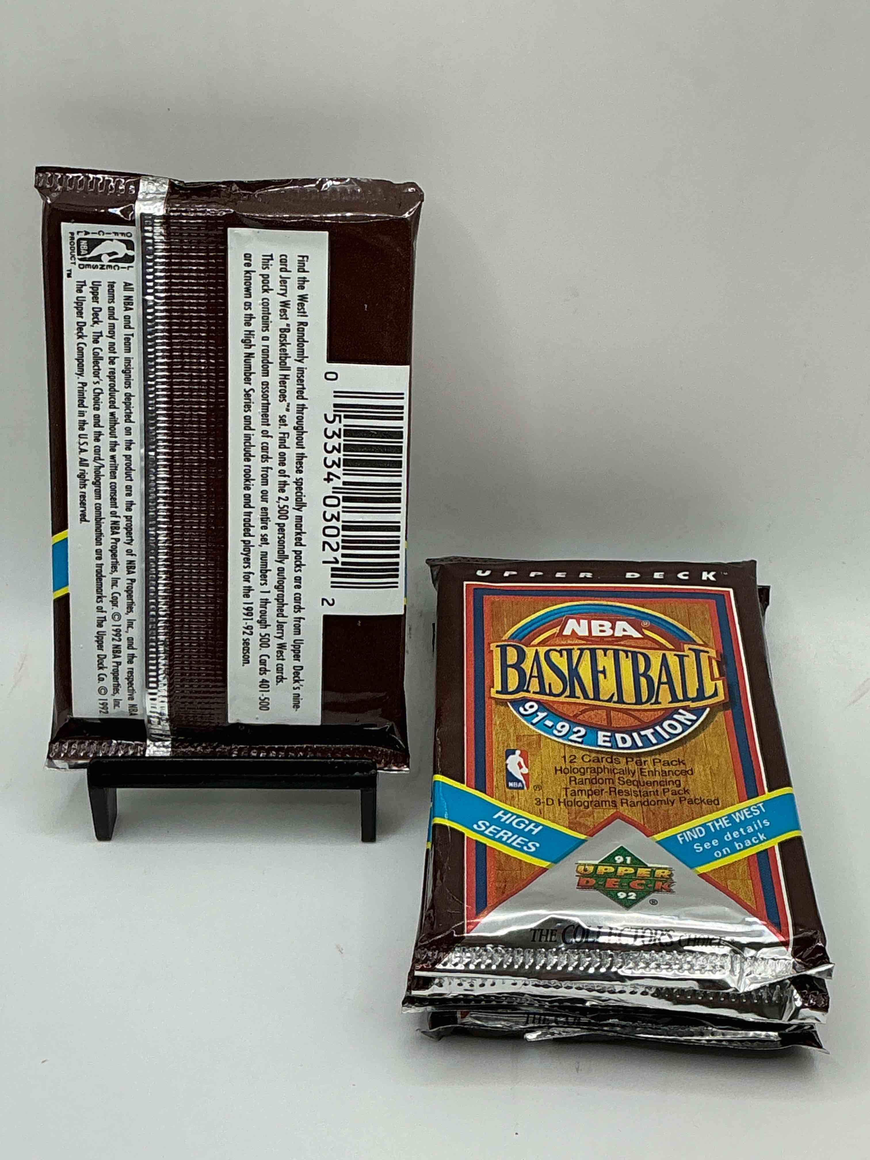 Condition photo showing New/Like New for wow, find the west! 1991/92 high series upper deck nba basketball sealed pack, direct from original sealed retail case! potential to find a jerry west signature card only in this high series... super rare! also search for valuable michael jordans & too many great cards to list! an awesome investment in sports card memorabilia! you may never see these again, super rare!