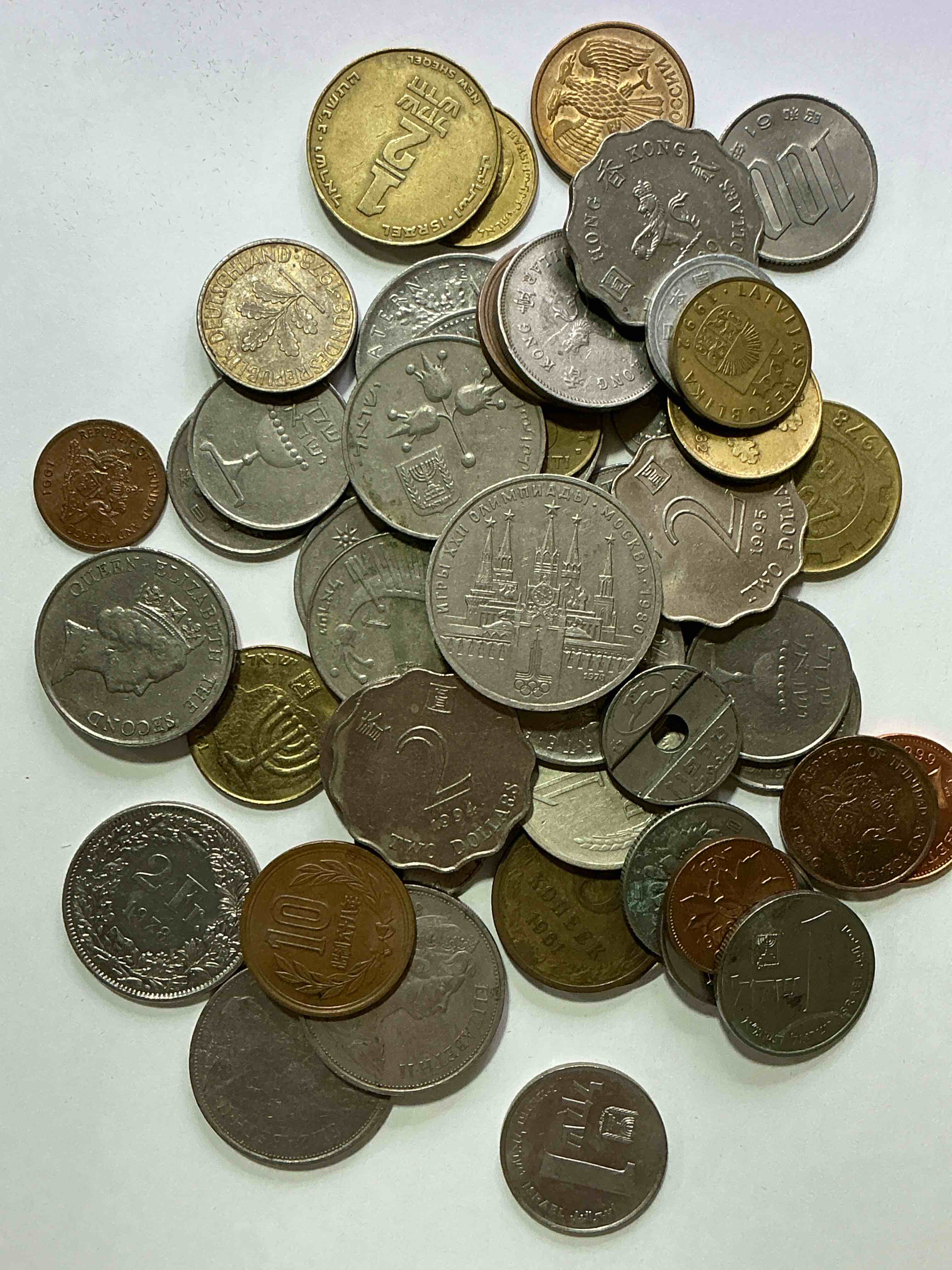 Condition photo showing Good Condition for world coins, antique & vintage! each lot is unique! many different years, countries, sizes & exotic places. this cool collection of antique coins from around the world is loads of fun! have fun identifying each coin & country as a great educational tool! a great investment too!