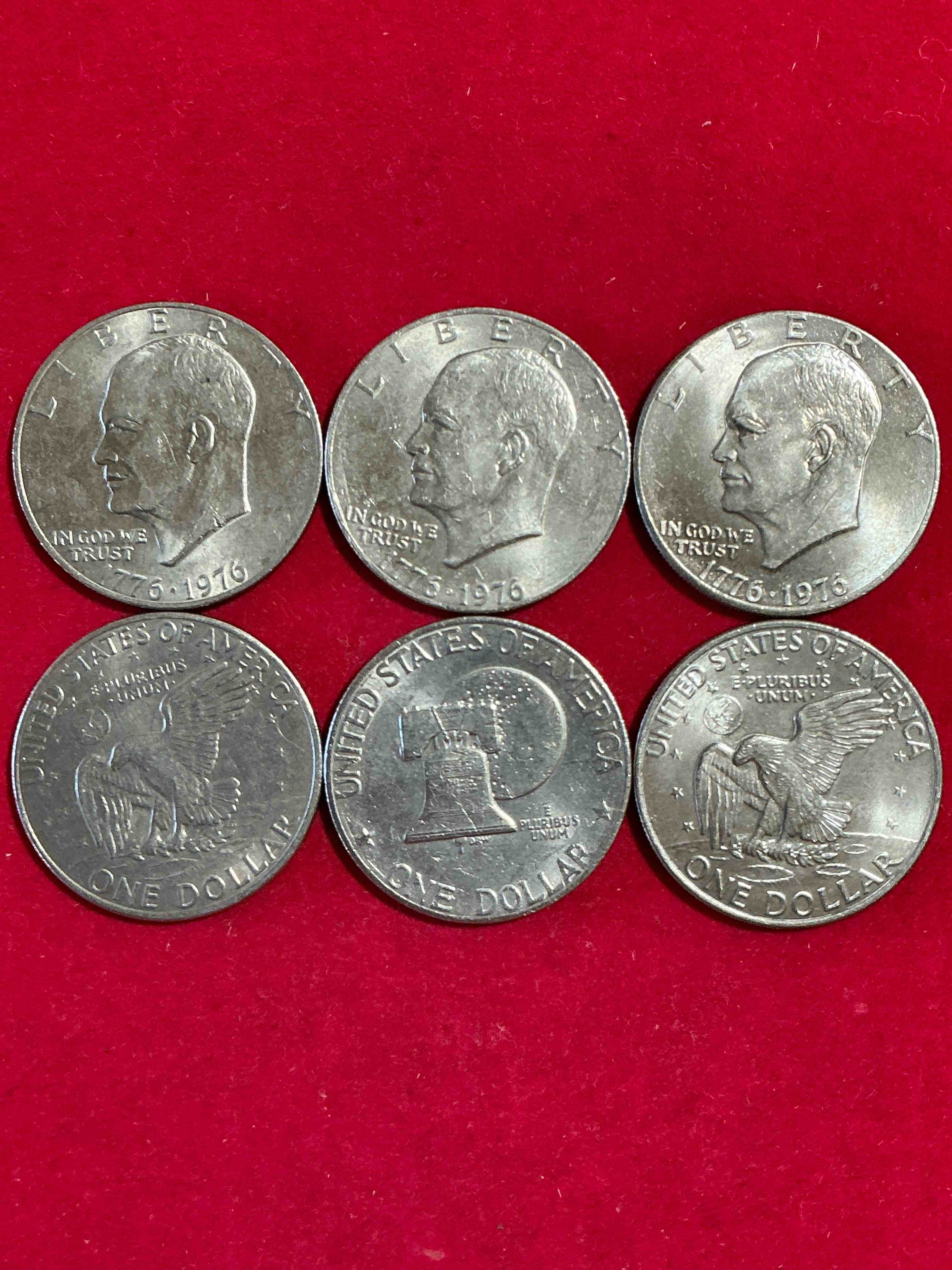 eisenhower dollars! here’s six circulated “ike” dollars! up for auction are ike one dollar coins from different years! 1976! awesome ike dollars!