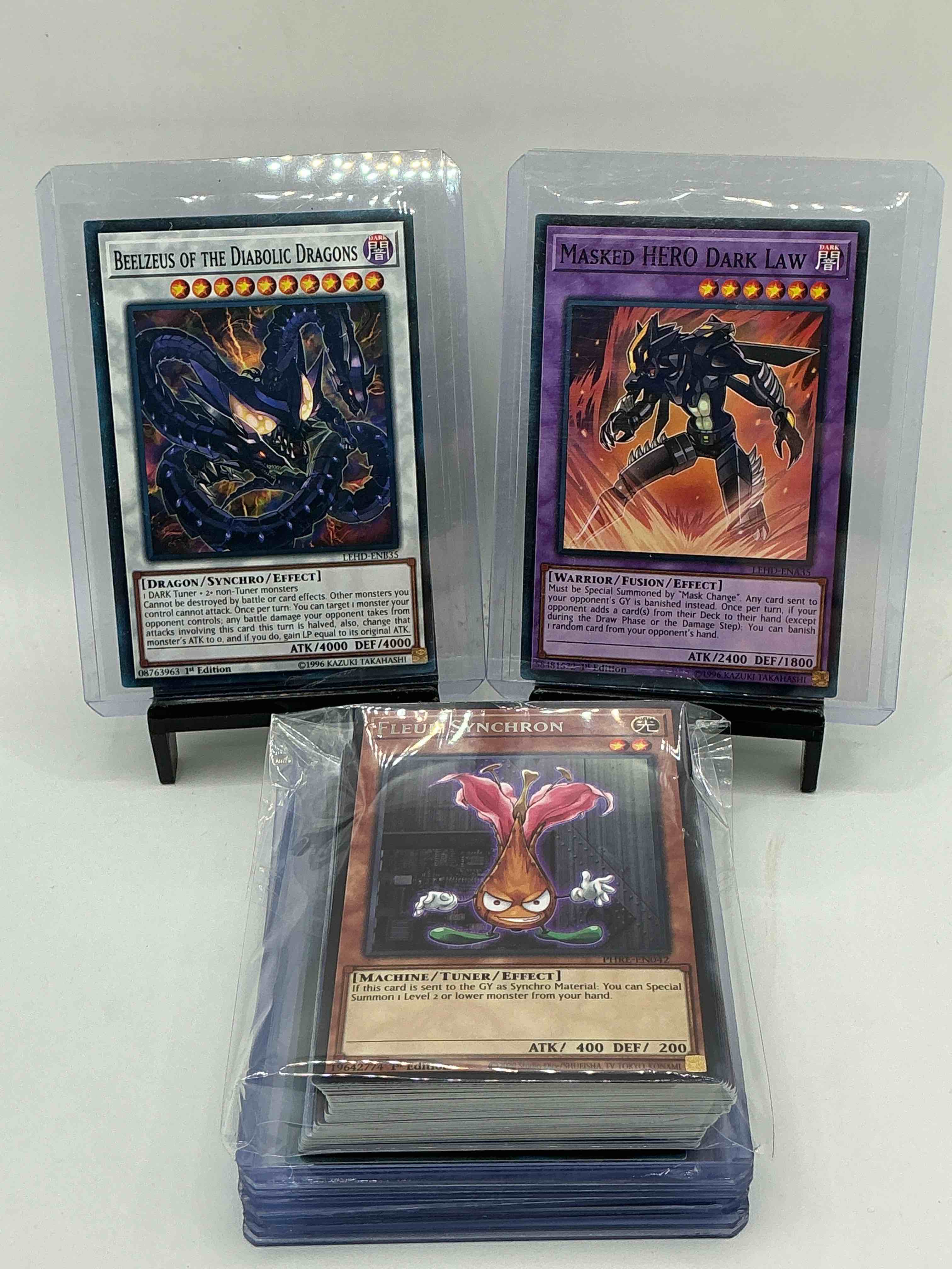 Condition photo showing New/Like New for yu-gi-oh 50 card lot! join the craze of yu-gi-oh with these awesome cards! this 50 card lot includes the big three yu-gi-oh category cards, monsters, spells & traps! this 50 card lot includes some of all three! wow! perfect time to start collecting!