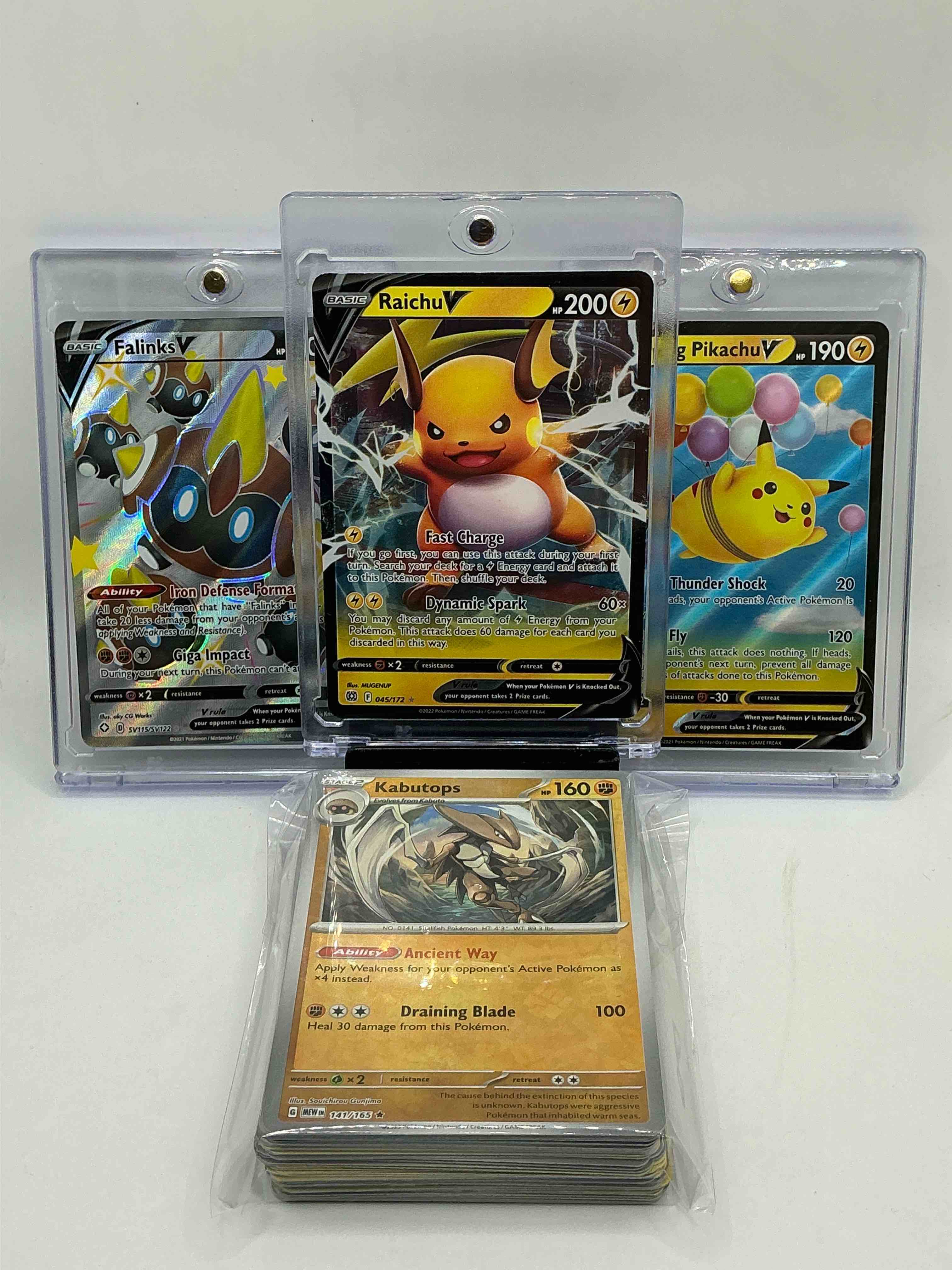 Pokémon Palooza! Raichu V! Flying Pikachu V! Falinks V! Along With 50 Other Pokémon Heroes, Holos, Legends & Commons- Including 1 Stage Two Rare Holographic, 2 Stage One Rare Holographic, 3 Basic Rare Holographic, 4 Common/ Uncommon Holographics (All Stages), 2 Stage Two Non Holographic & 2 Rares! Also Includes 36 Non Holo Common/ Uncommon Basic & First Stage Cards Trainers & Energy Too! Perfect Set For Collectors & Enthusiasts!