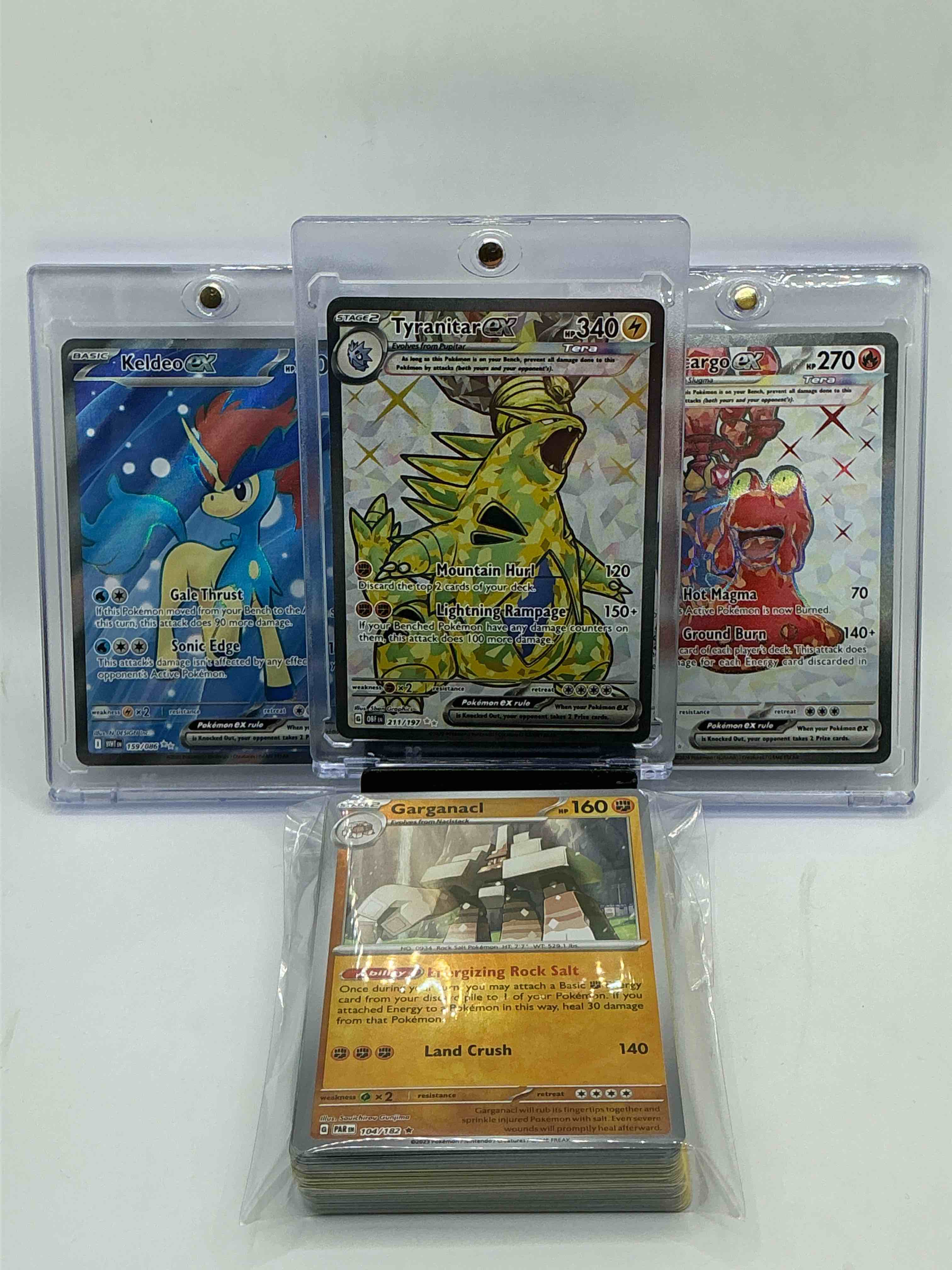 Pokémon Palooza! Tyranitar EX! Magcargo EX! Keldeo EX! Along With 50 Other Pokémon Heroes, Holos, Legends & Commons- Including 1 Stage Two Rare Holographic, 2 Stage One Rare Holographic, 3 Basic Rare Holographic, 4 Common/ Uncommon Holographics (All Stages), 2 Stage Two Non Holographic & 2 Rares! Also Includes 36 Non Holo Common/ Uncommon Basic & First Stage Cards Trainers & Energy Too! Perfect Set For Collectors & Enthusiasts!