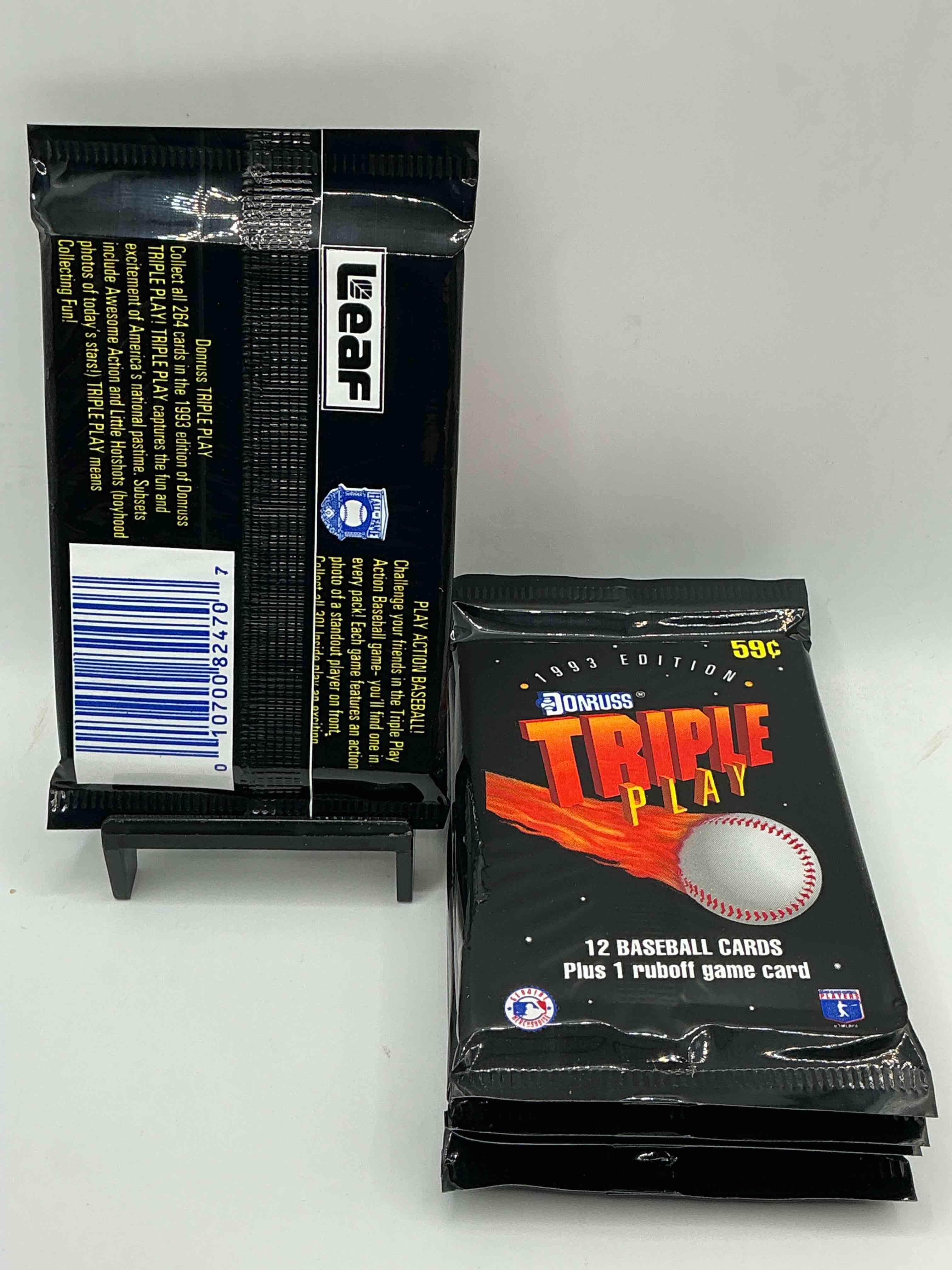 Condition photo showing New/Like New for 1993 donruss triple play mlb baseball 18 card packs! look for 1 ruboff game cards along with griffey jr, mcgwire, ryan & more! rare packs!