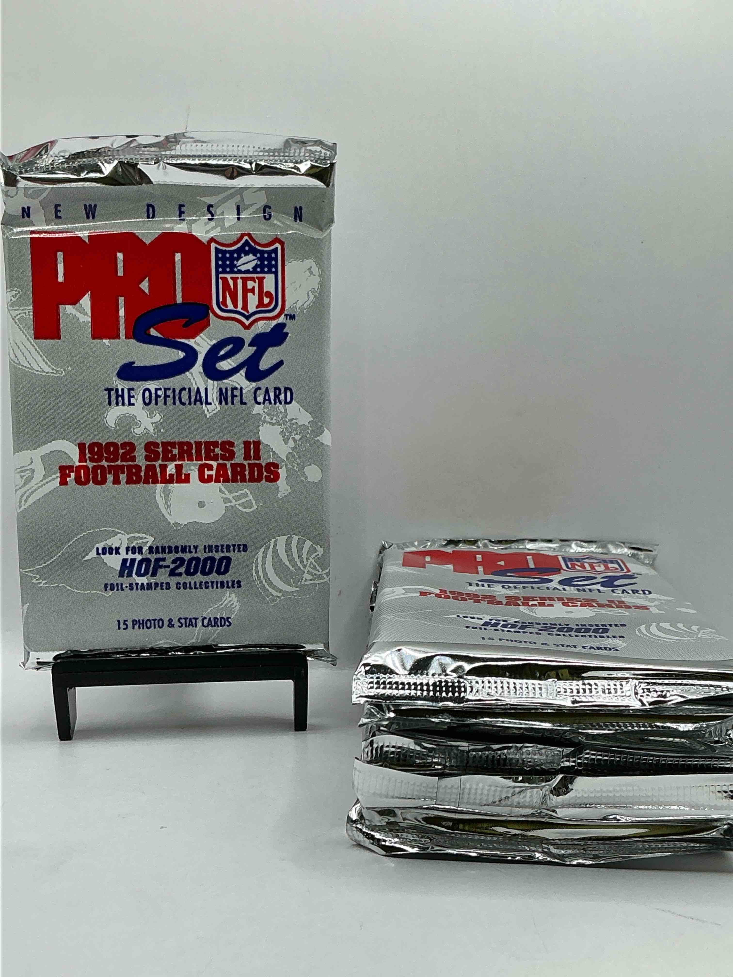 Condition photo showing New/Like New for nfl pro set! wow! 1992 series ii football cards! possible rice, montana, elway, sanders, jackson & more! search for limited edition randomly inserted hof 2000 stamped collectibles!