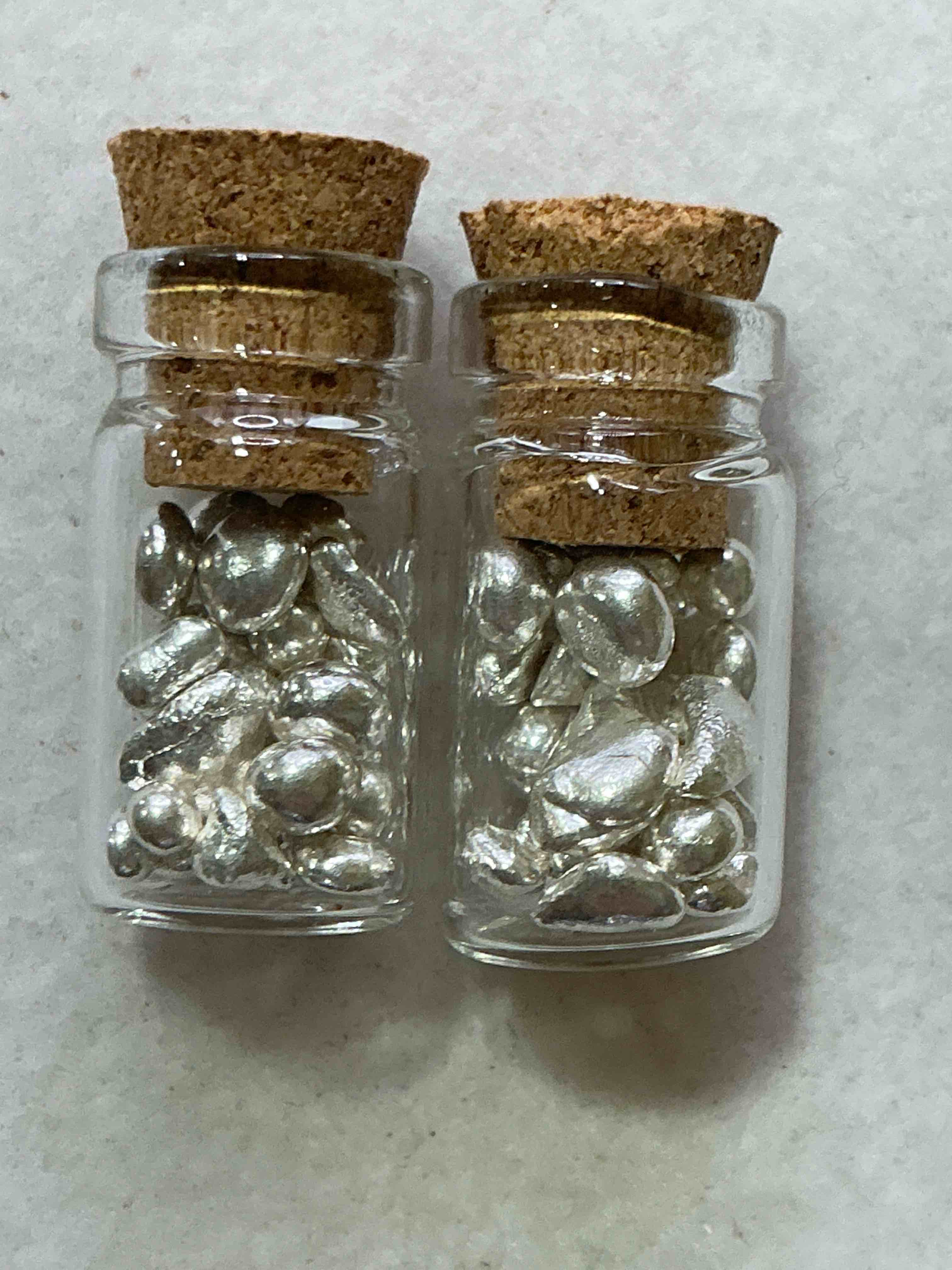 Condition photo showing New/Like New for silver nuggets! .999 us fine silver, in small nugget form! total weight of all nuggets in lot approximately 6 grams, bid is per nugget! a cool way to invest in fine us silver! includes collector capsule!