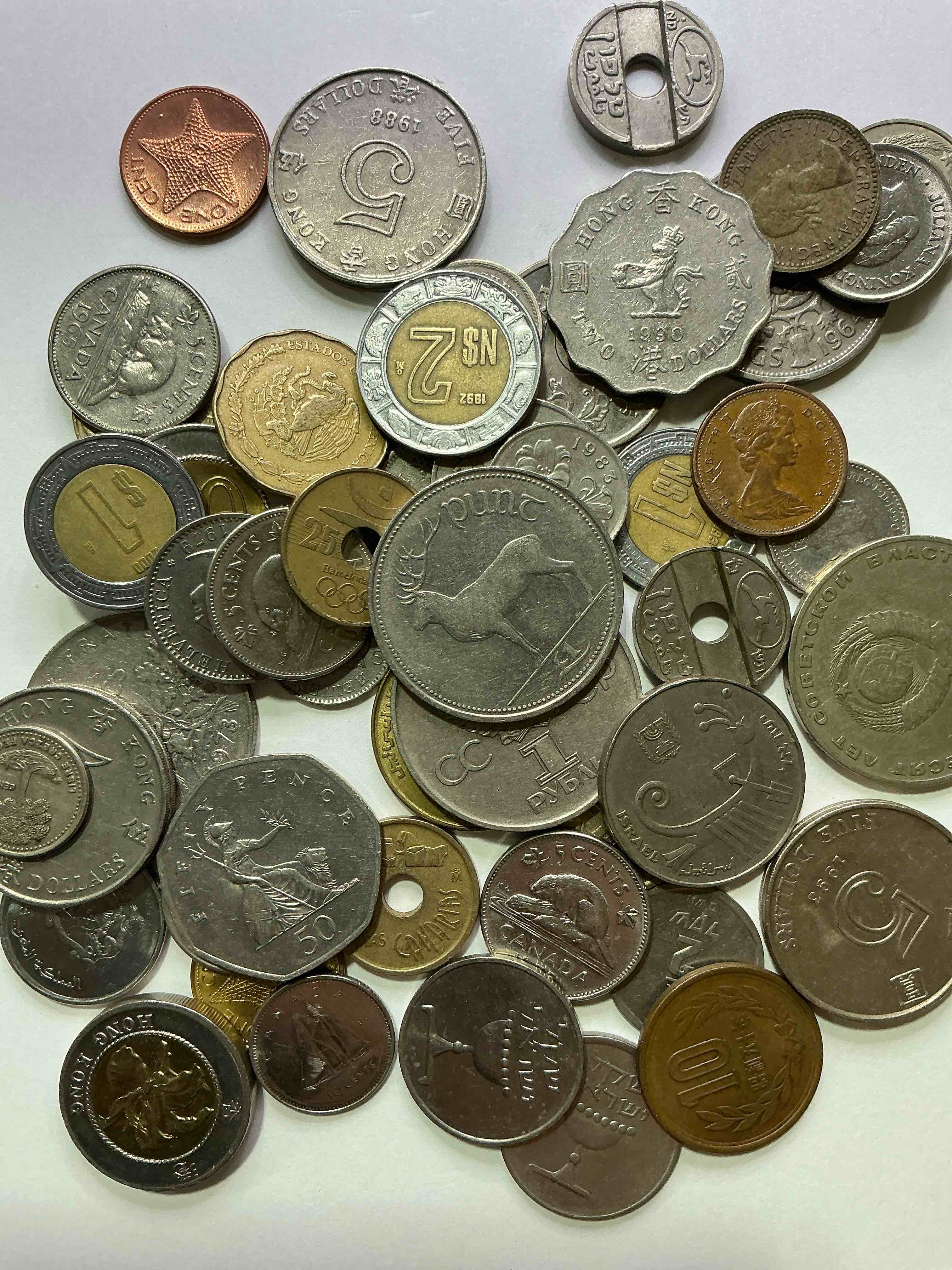 Condition photo showing Good Condition for world coins, antique & vintage! each lot is unique! many different years, countries, sizes & exotic places. this cool collection of antique coins from around the world is loads of fun! have fun identifying each coin & country as a great educational tool! a great investment too!