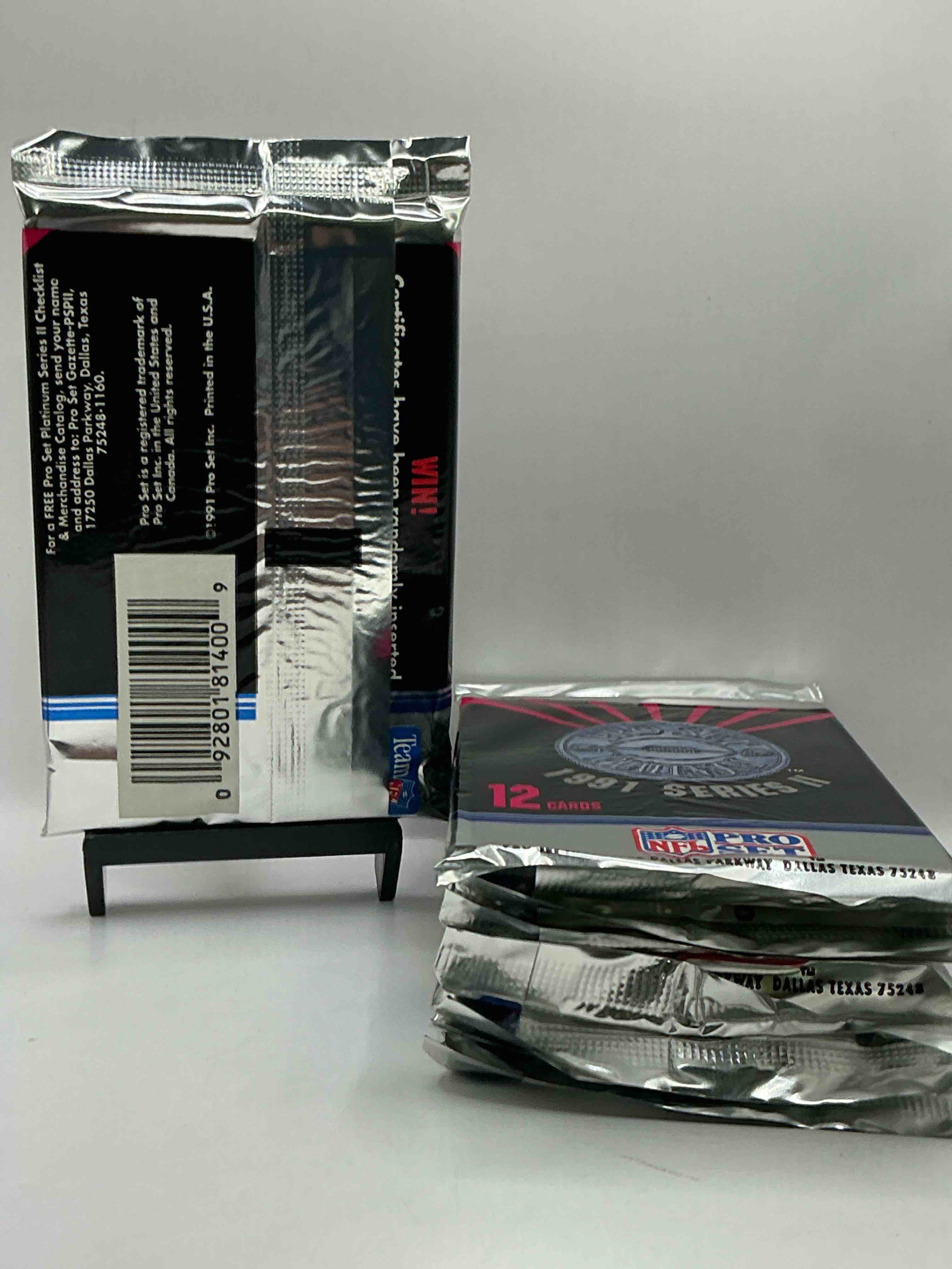 Condition photo showing New/Like New for 1991 pro set platinum edition series ii unopened packs! search for brett favre rookie & bill belichick coach rookie card as well as santa claus card!