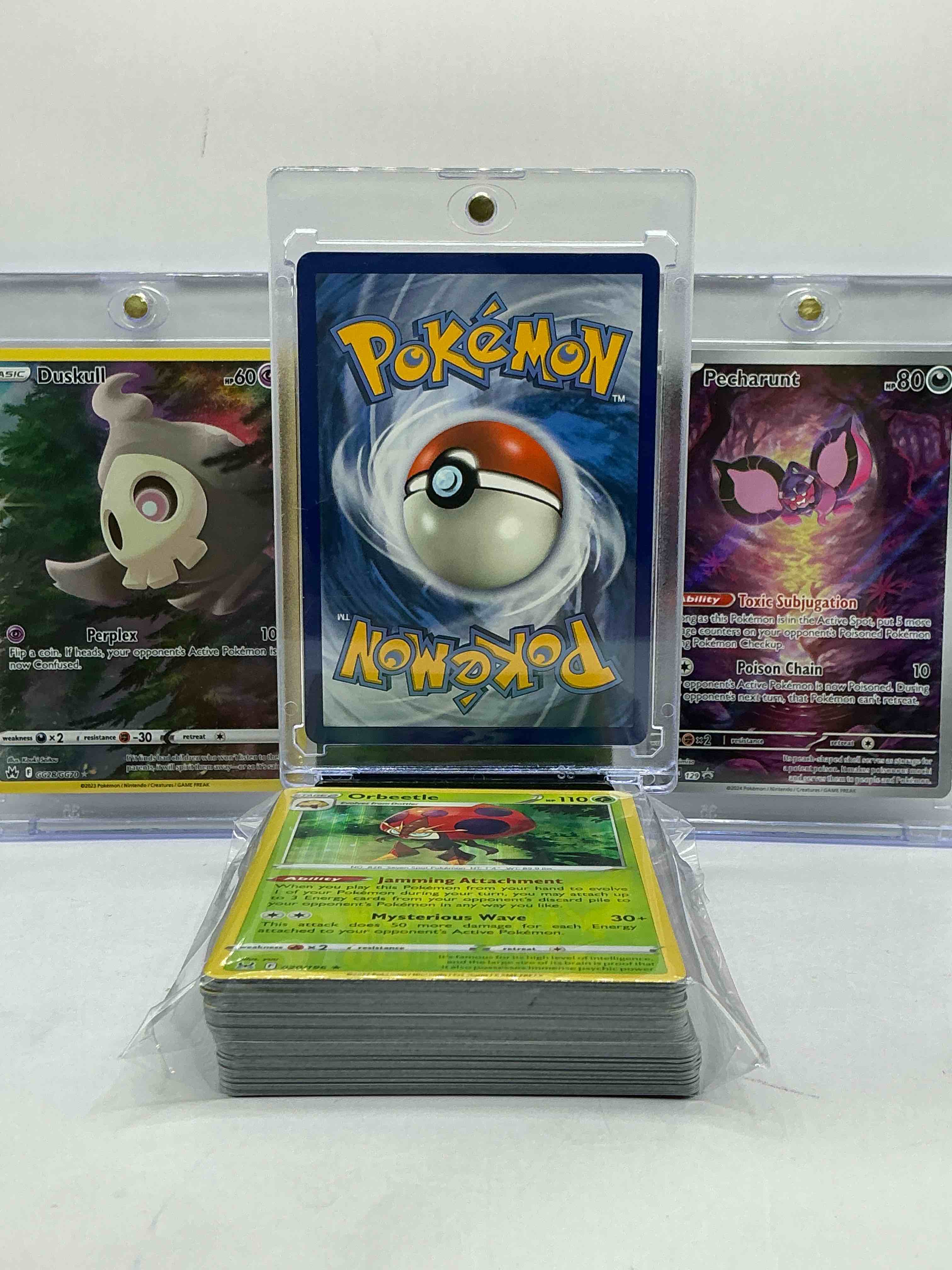 Condition photo showing New/Like New for charizard gx holo, duskull full art & pecharunt full art & more! along with 50 other pokémon heroes, holos, legends & commons- including 1 stage two rare holographic, 2 stage one rare holographic, 3 basic rare holographic, 4 common/ uncommon holographics (all stages), 2 stage two non holographic & 2 rares! also includes 36 non holo common/ uncommon basic & first stage cards trainers & energy too! perfect set for collectors & enthusiasts!