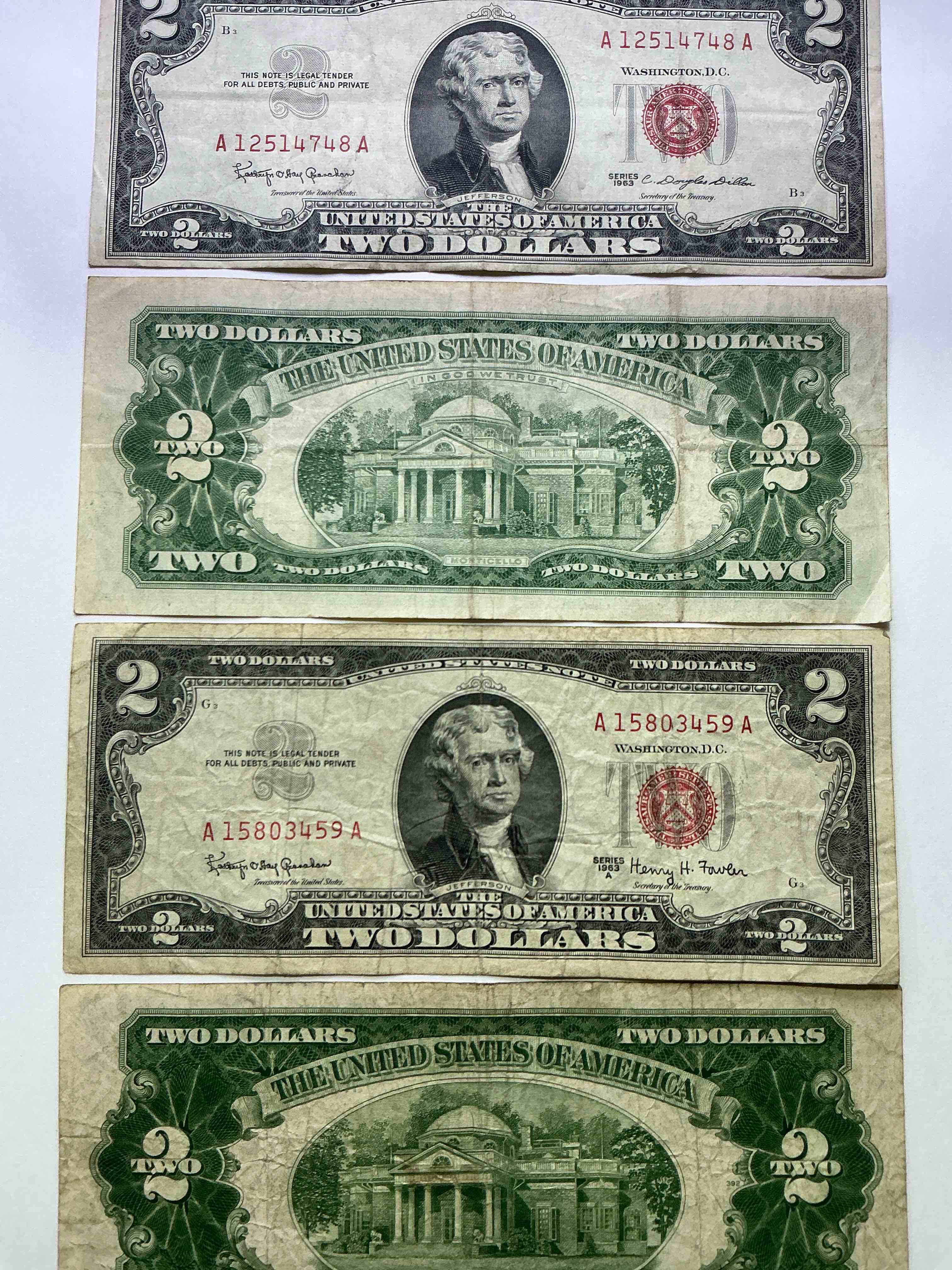 Condition photo showing Good Condition for rare red seal two dollar bills! 1963 edition paper money! check out these rare bills, perfect addition to any collection!