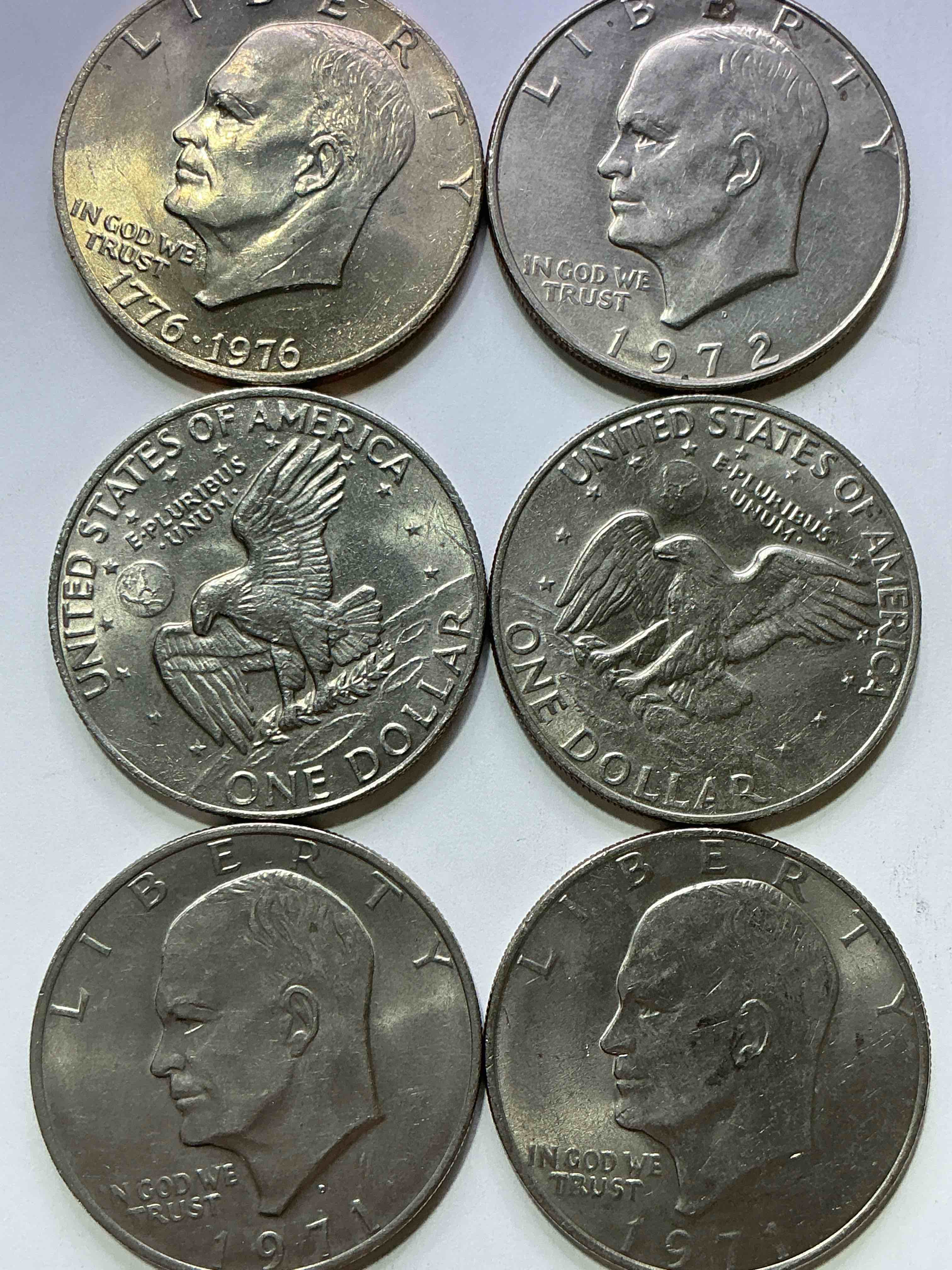 Condition photo showing New/Like New for gorgeous eisenhower dollar coins! these striking, large u.s. coins were minted from 1971-1978. here are gorgeous examples of “ike" dollars from 1976 & other years! these coins have become immensely popular with collectors & some have great toning!