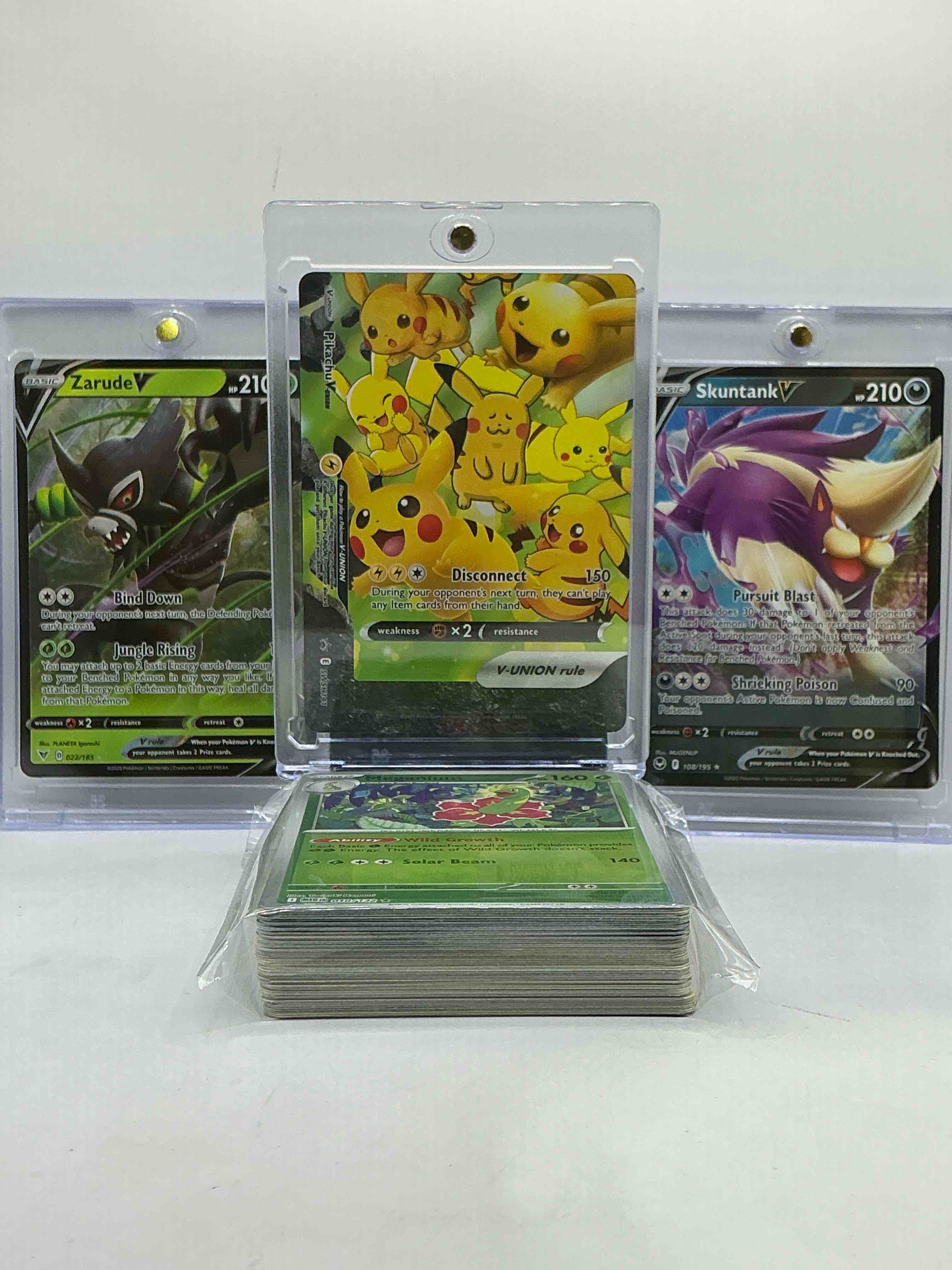 Pikachu Union V, Zarude V, Skuntank V & More! Pokémon Palooza! These Monsters, Along With 50 Other Pokémon Heroes, Holos, Legends & Commons- Including 1 Stage Two Rare Holographic, 2 Stage One Rare Holographic, 3 Basic Rare Holographic, 4 Common/ Uncommon Holographics (All Stages), 2 Stage Two Non Holographic & 2 Rares! Also Includes 36 Non Holo Common/ Uncommon Basic & First Stage Cards Trainers & Energy Too! Perfect Set For Collectors & Enthusiasts!