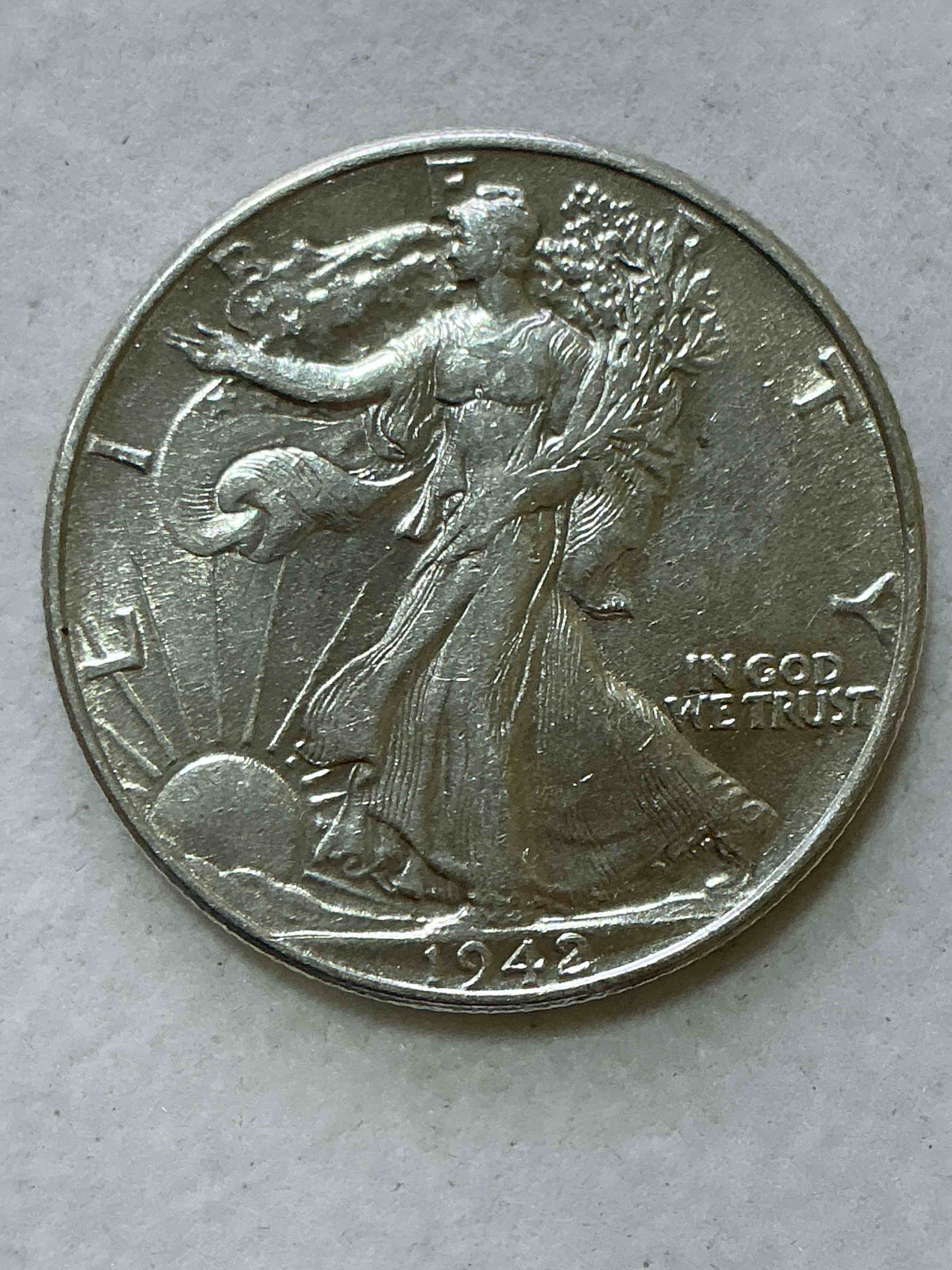 World War II Era Silver! Antique U.S. Silver! Liberty Walking Silver Fine U.S. Silver Half Dollar! This Striking Half Dollars Were Minted From 1916-1947 & Have Become Some Of The Most Collectible Coins In History! Here Is A Striking Appears Uncirculated Example From 1942! Liberty Walking Coins Are 90% Fine U.S. Silver, A Great Investment In Precious Metal!
