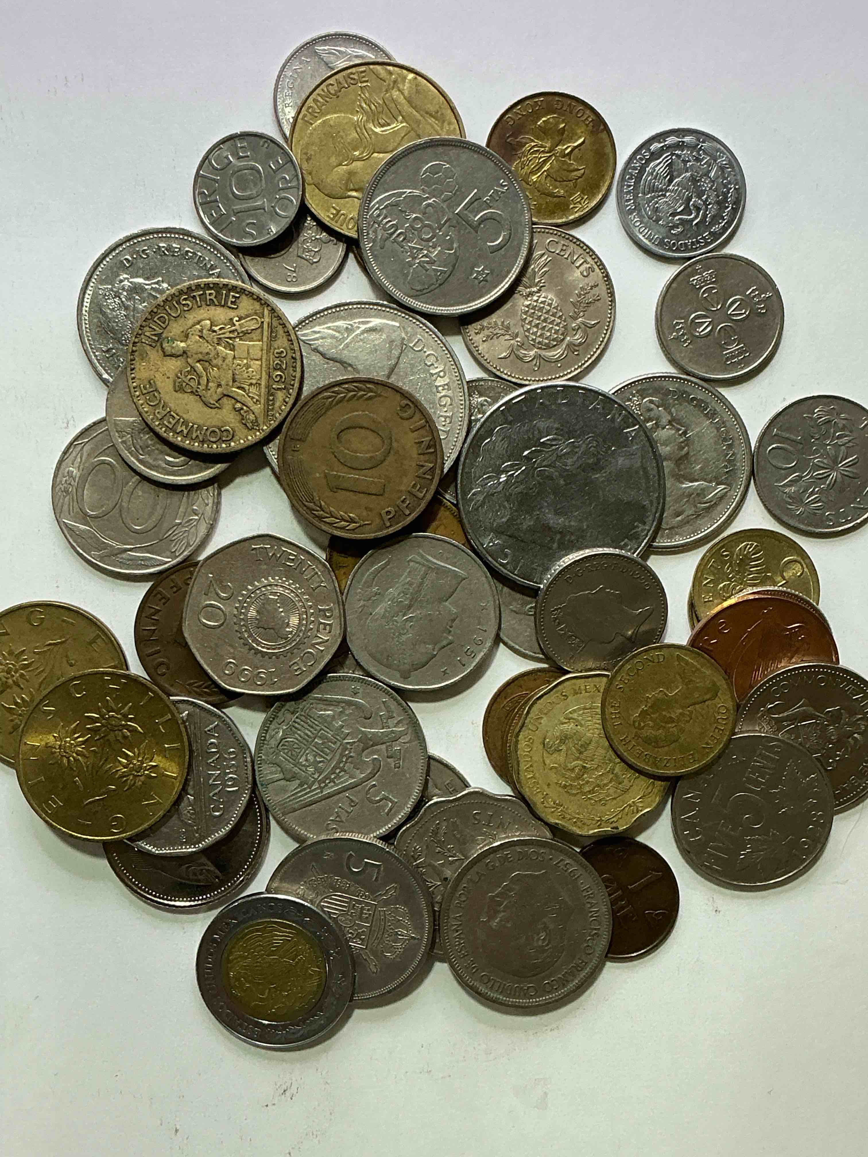 Condition photo showing Good Condition for world coins, antique & vintage! each lot is unique! many different years, countries, sizes & exotic places. this cool collection of antique coins from around the world is loads of fun! have fun identifying each coin & country as a great educational tool! a great investment too!
