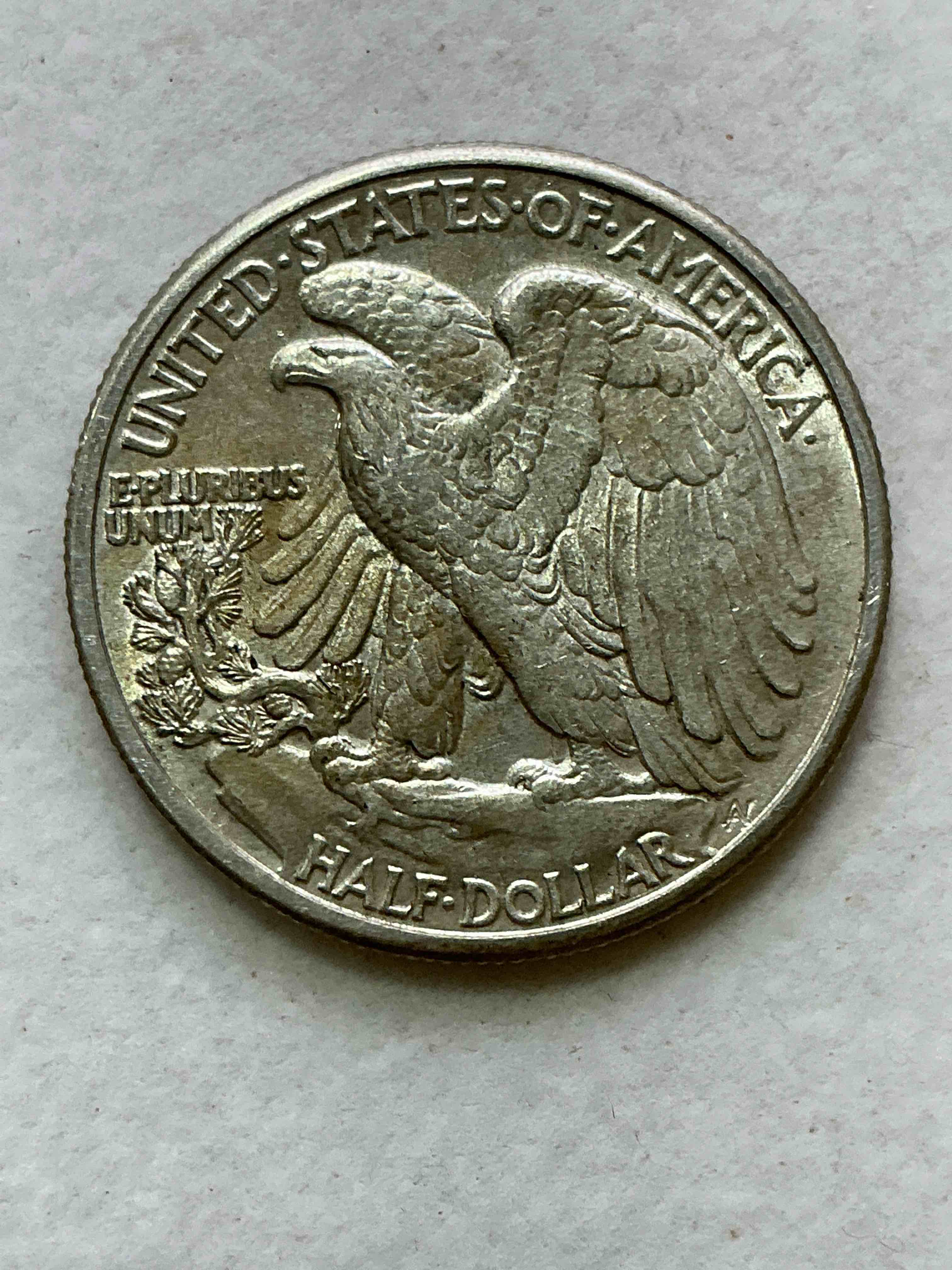 Condition photo showing New/Like New for world war ii era silver! antique u.s. silver! liberty walking silver fine u.s. silver half dollar! this striking half dollars were minted from 1916-1947 & have become some of the most collectible coins in history! here is a striking appears uncirculated example from 1942! liberty walking coins are 90% fine u.s. silver, a great investment in precious metal!
