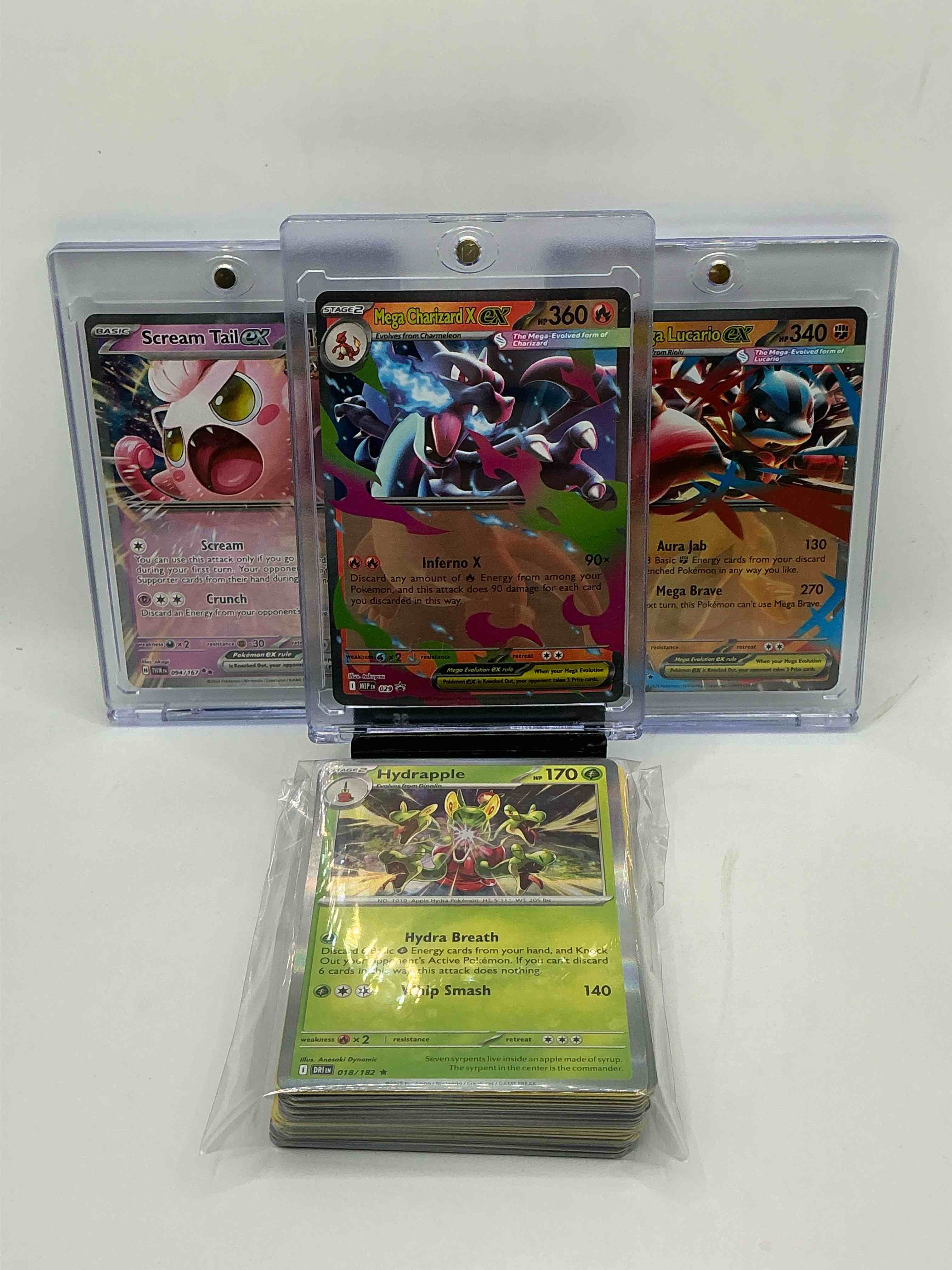 Mega Charizard X EX! Mega Lucario EX! Scream Tail EX! Along With 50 Other Pokémon Heroes, Holos, Legends & Commons- Including 1 Stage Two Rare Holographic, 2 Stage One Rare Holographic, 3 Basic Rare Holographic, 4 Common/ Uncommon Holographics (All Stages), 2 Stage Two Non Holographic & 2 Rares! Also Includes 36 Non Holo Common/ Uncommon Basic & First Stage Cards Trainers & Energy Too! Perfect Set For Collectors & Enthusiasts!