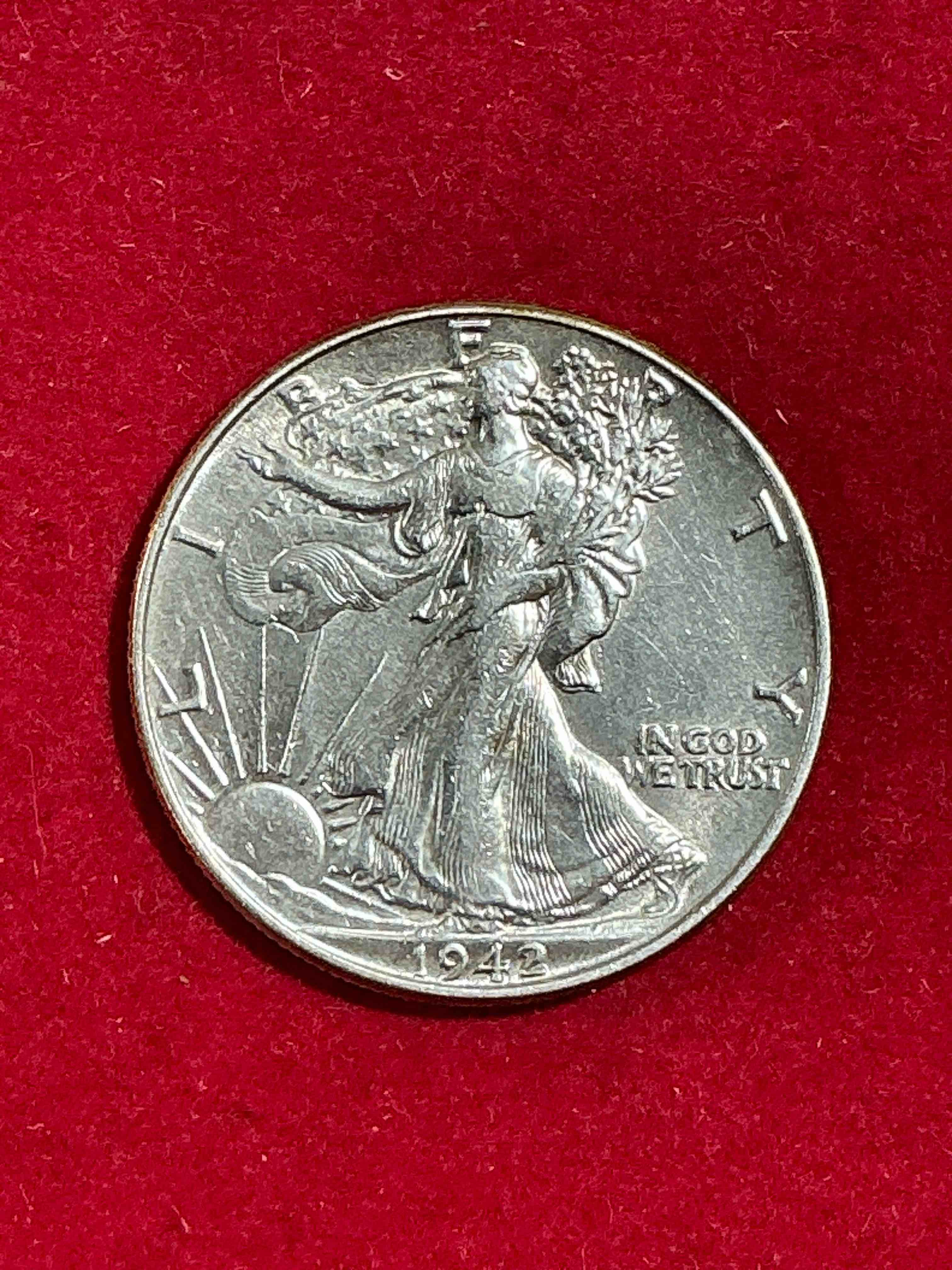World War II Era Silver! Antique U.S. Silver! Stunning Uncirculated Liberty Walking Silver Half Dollars! These Striking Half Dollars Were Minted From 1916-1947 & Have Become Some Of The Most Collectible Coins In History! Here Is A Striking Uncirculated Example From 1942! Liberty Walking Coins Are 90% Fine U.S. Silver, A Great Investment In Precious Metal!