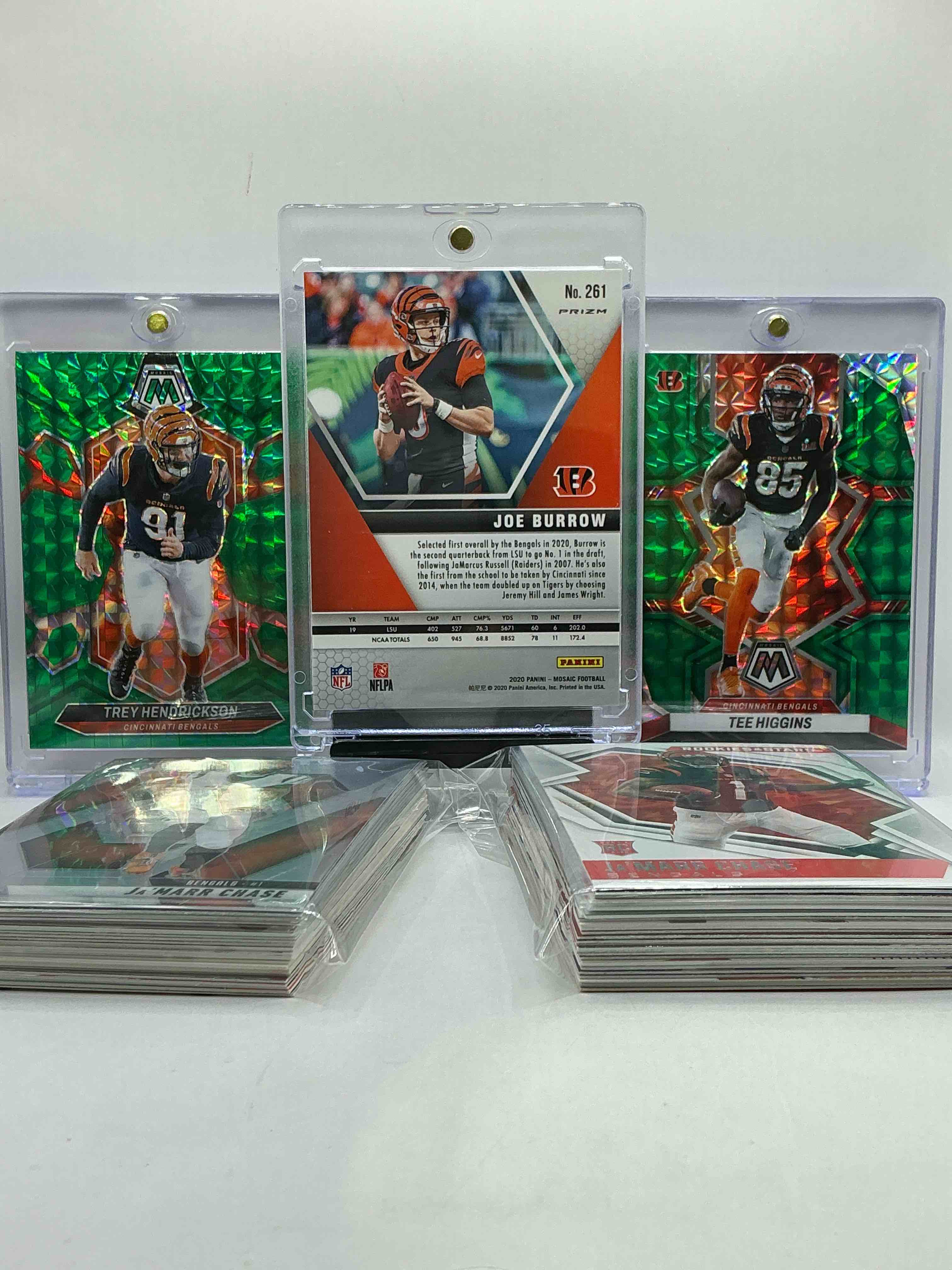 Condition photo showing New/Like New for good gracious! green mosaics! joe burrow green rookie card, trey hendrickson & tee higgins! wow! this 50 card lot includes commons, legends, heroes, rookies, vintage & new & more! wow! bengals bonanza!