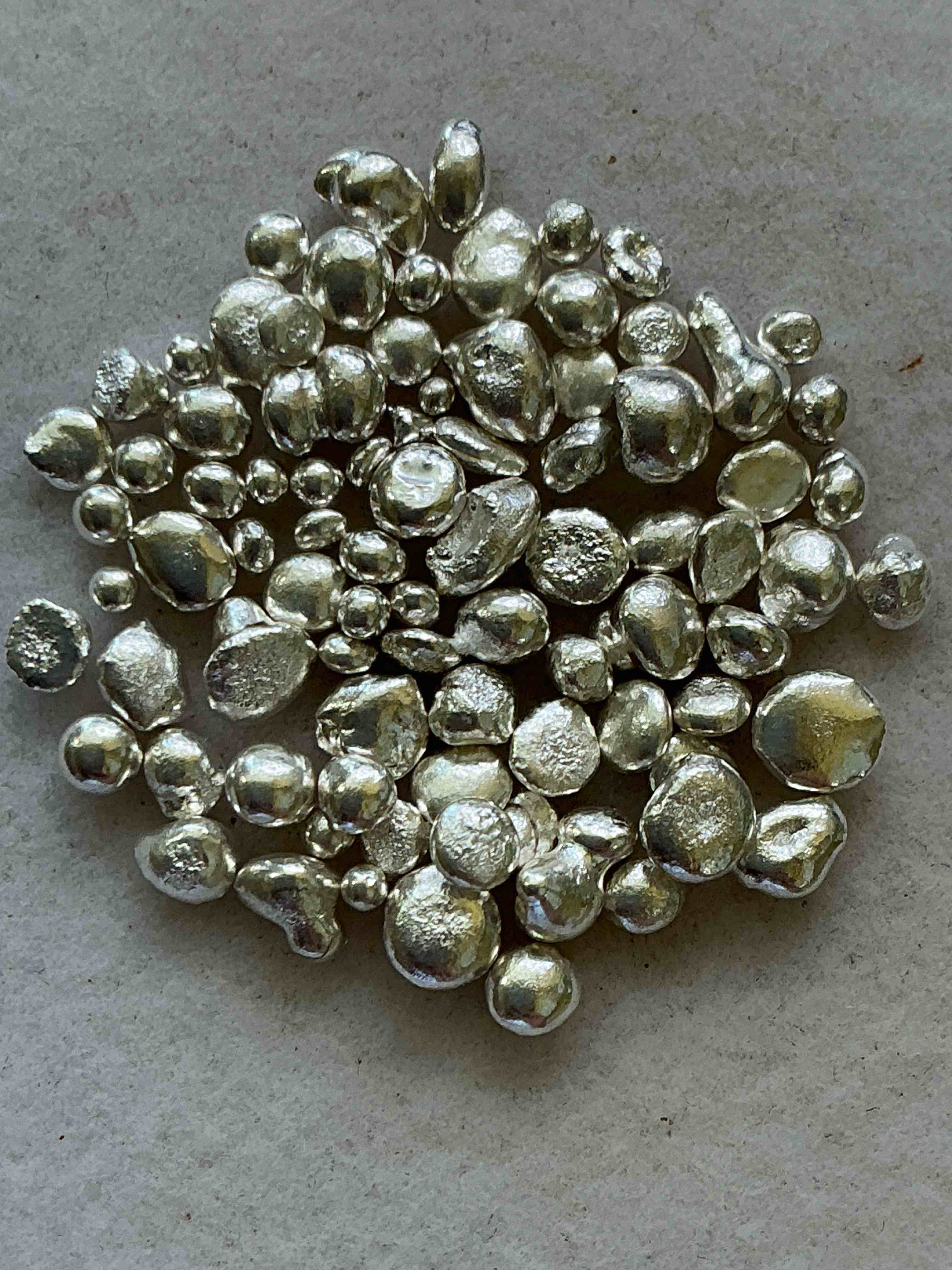 silver nuggets! .999 us fine silver, in small nugget form! total weight of all nuggets in lot approximately 6 grams, bid is per nugget! a cool way to invest in fine us silver! includes collector capsule!