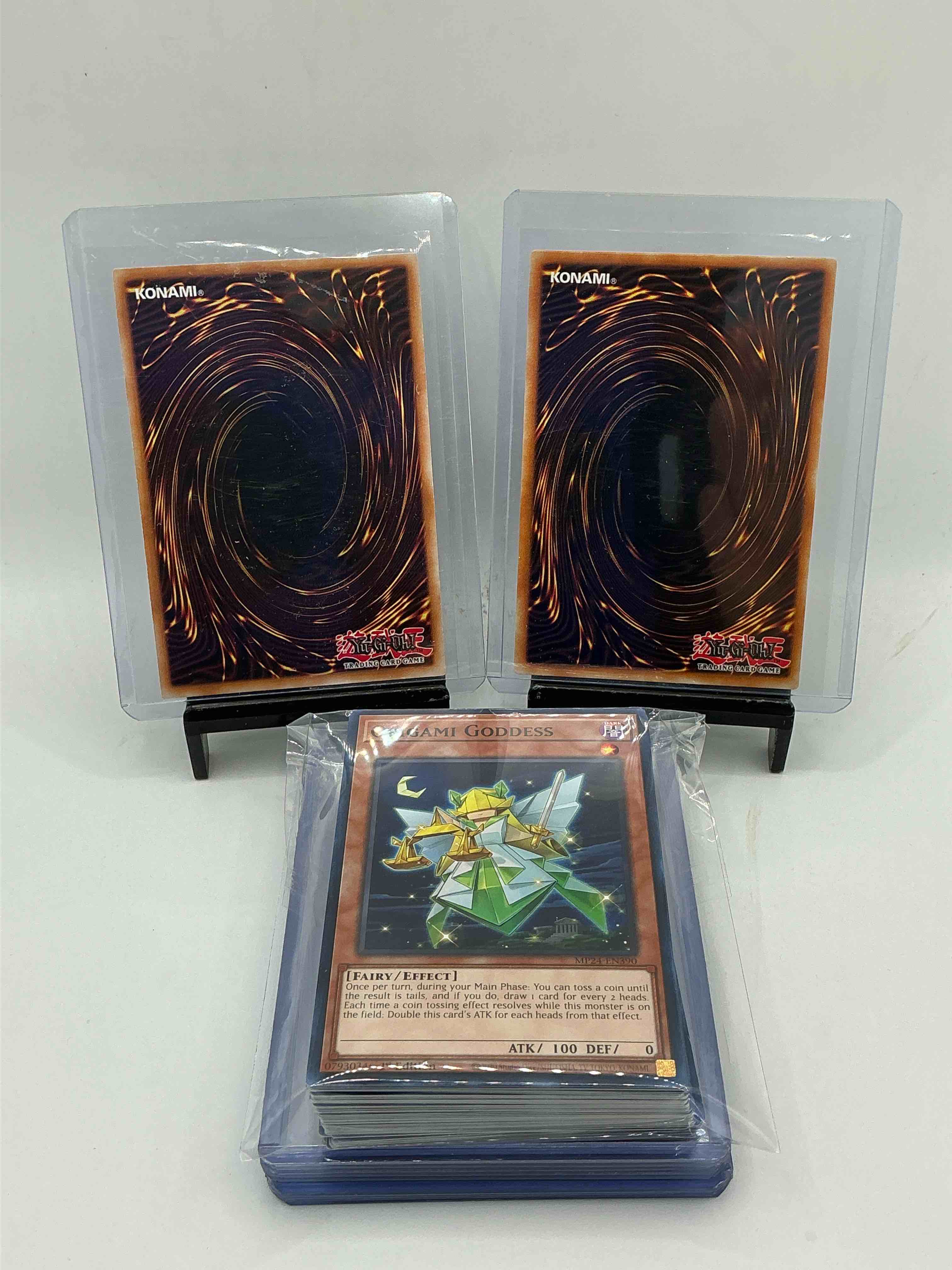 Condition photo showing New/Like New for yu-gi-oh 50 card lot! join the craze of yu-gi-oh with these awesome cards! this 50 card lot includes the big three yu-gi-oh category cards, monsters, spells & traps! this 50 card lot includes some of all three! wow! perfect time to start collecting! 