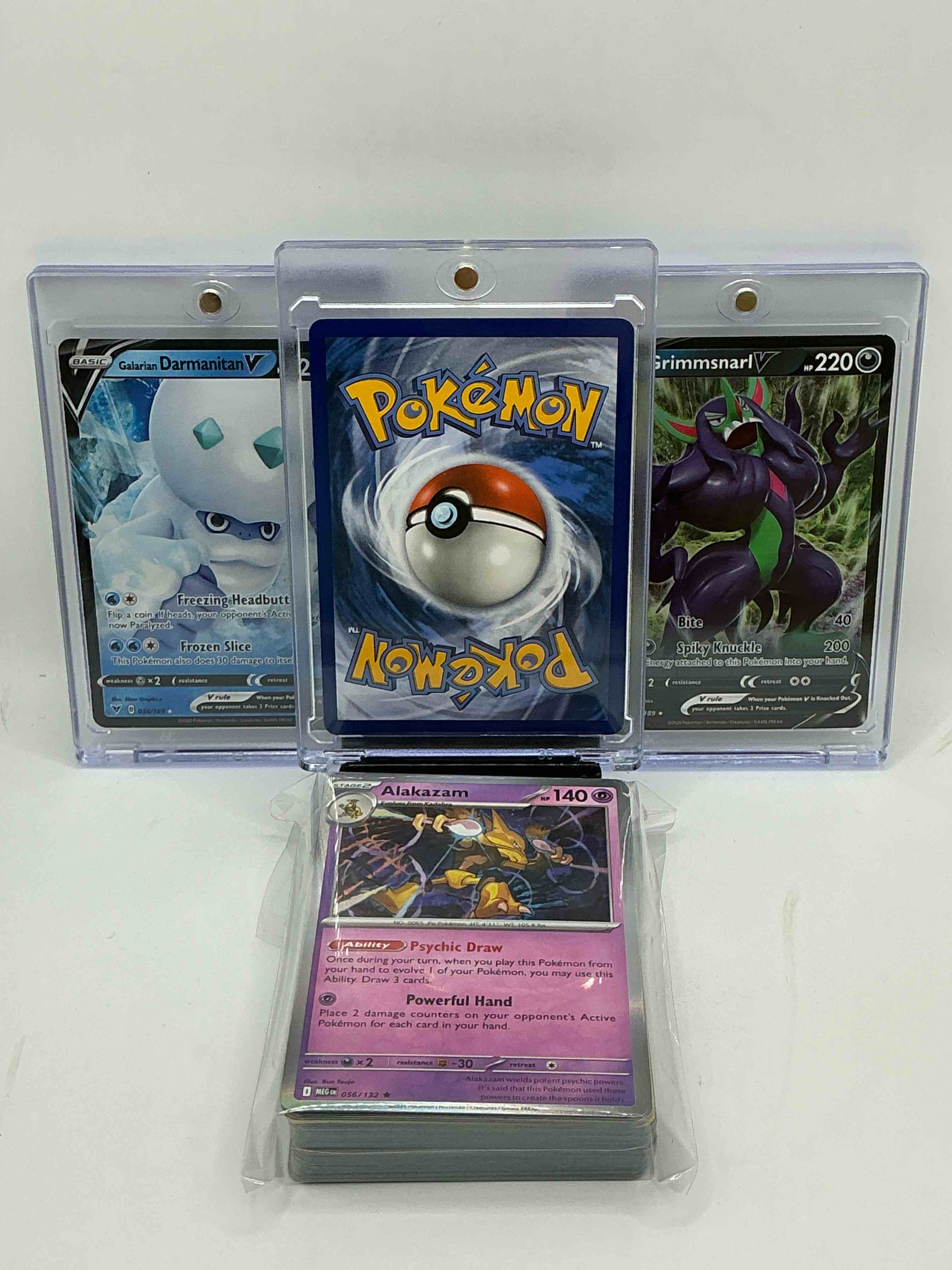 Condition photo showing New/Like New for pokémon palooza! cramorant v! galarian darmanitan v! grimmsnarl v! along with 50 other pokémon heroes, holos, legends & commons- including 1 stage two rare holographic, 2 stage one rare holographic, 3 basic rare holographic, 4 common/ uncommon holographics (all stages), 2 stage two non holographic & 2 rares! also includes 36 non holo common/ uncommon basic & first stage cards trainers & energy too! perfect set for collectors & enthusiasts!