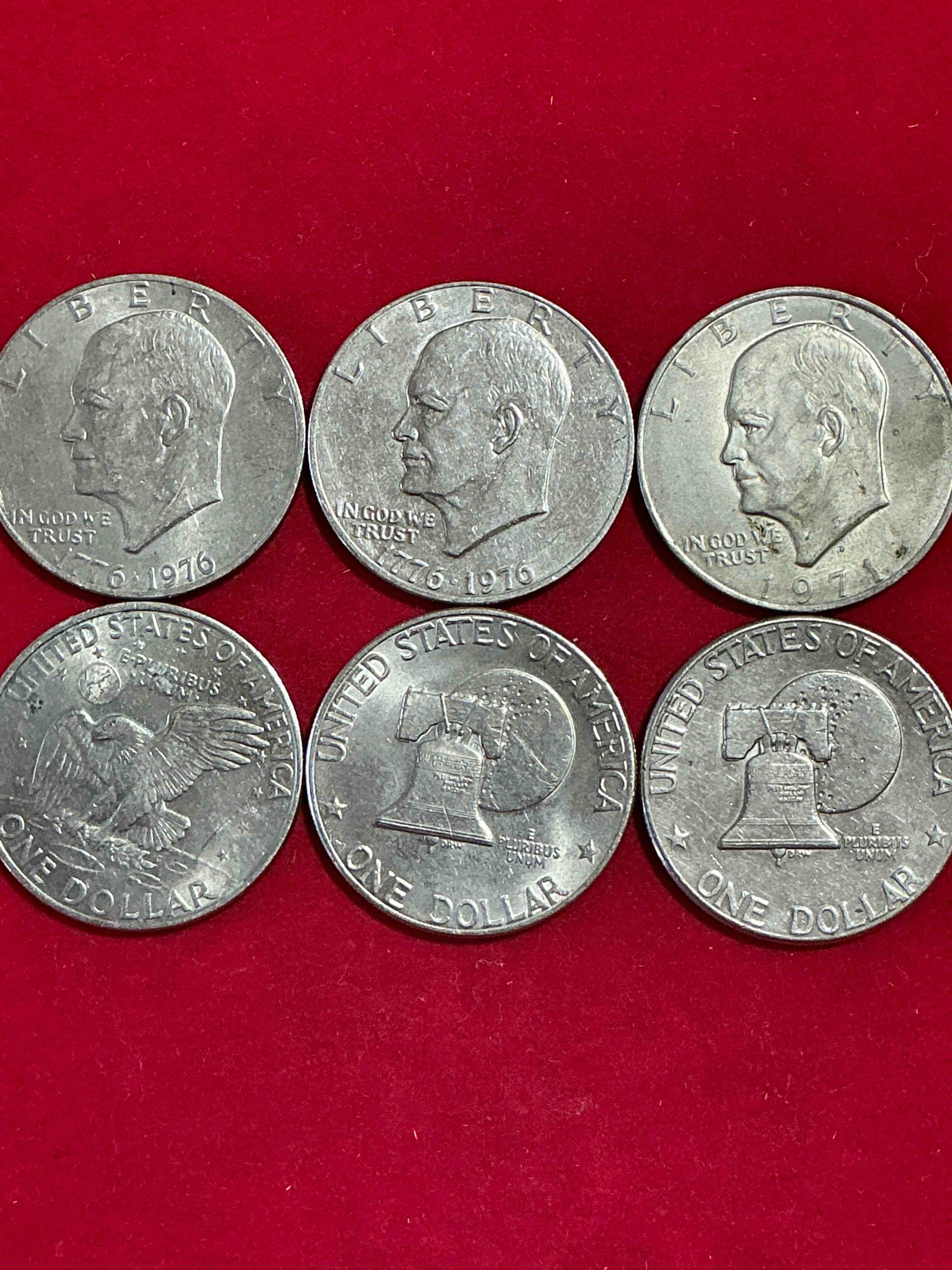 eisenhower dollars! here’s six circulated “ike” dollars! up for auction are ike one dollar coins from different years! 1976! awesome ike dollars!
