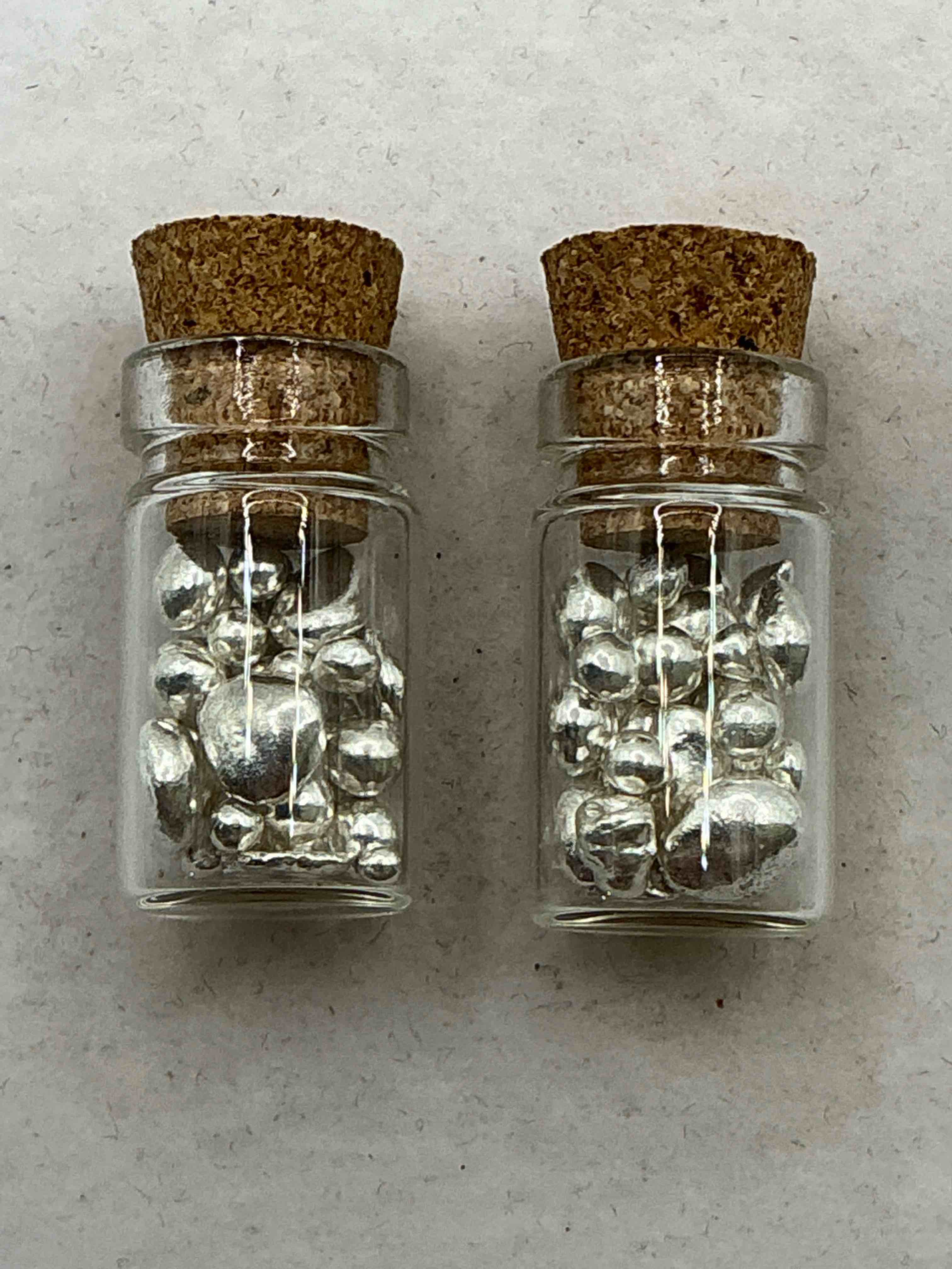 Silver Nuggets! .999 US Fine Silver, In Small Nugget Form! Total Weight Of All Nuggets In Lot Approximately 6 Grams, Bid Is Per Nugget! A Cool Way To Invest In Fine US Silver! Includes Collector Capsule!