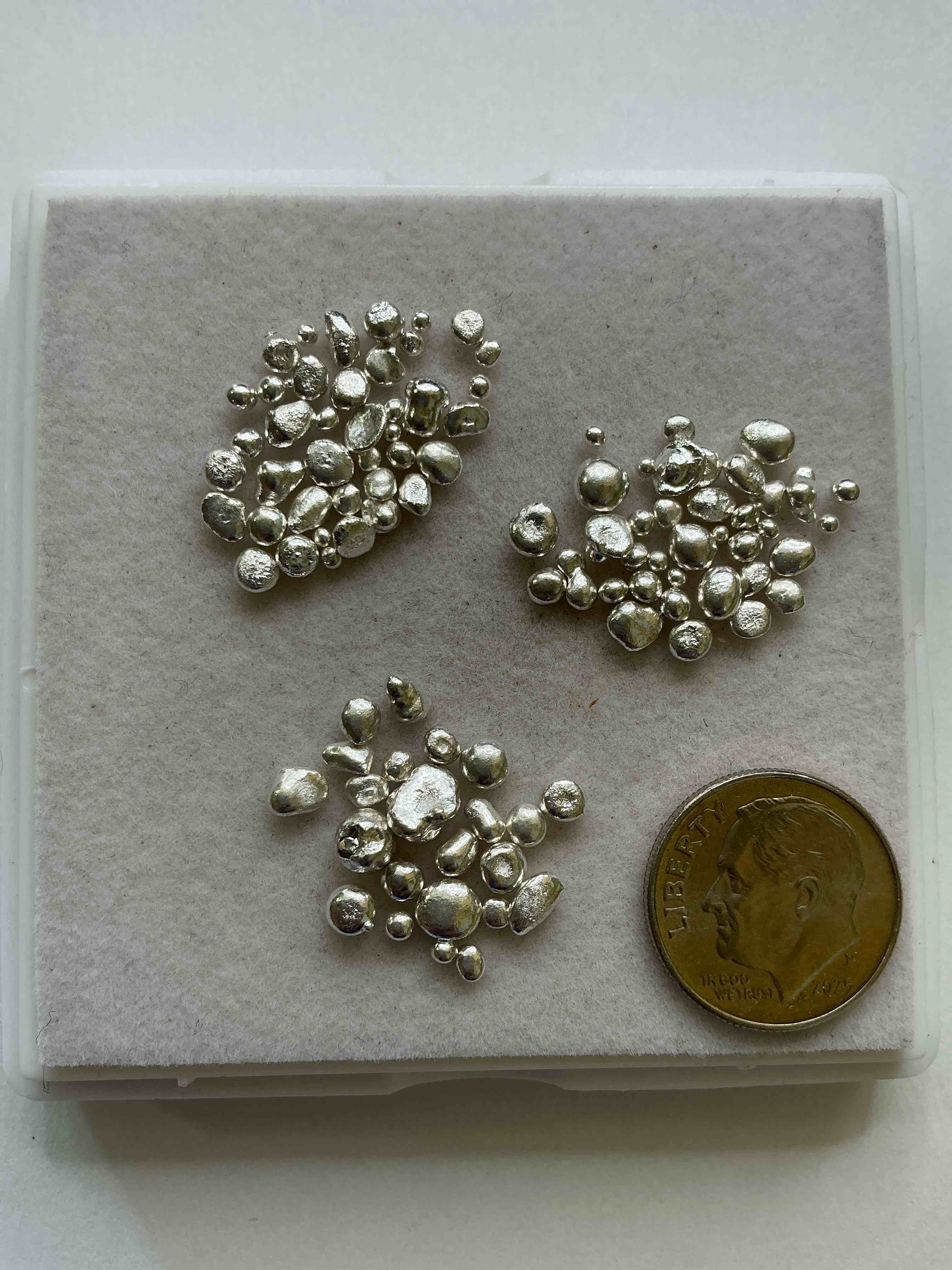 silver nuggets! .999 us fine silver, in small nugget form! total weight of all nuggets in lot approximately 6 grams, bid is per nugget! a cool way to invest in fine us silver! includes collector capsule!