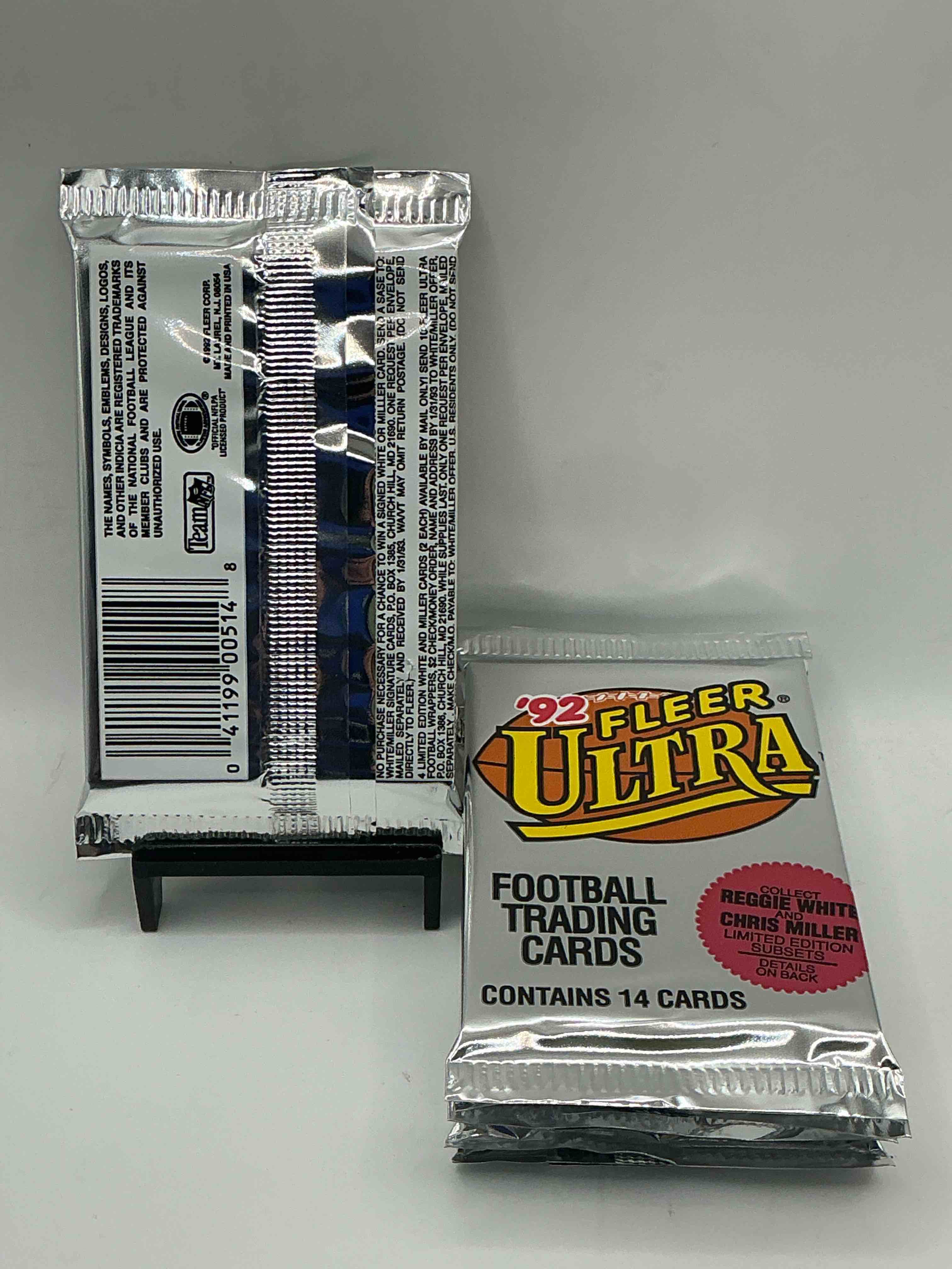Condition photo showing New/Like New for 1992 fleer ultra football unopened packs, straight from box! search for awesome cards from barry sanders, emmitt smith, brett favre & other 80's & early 90's stars! also, search for mark rypien performance highlights cards!