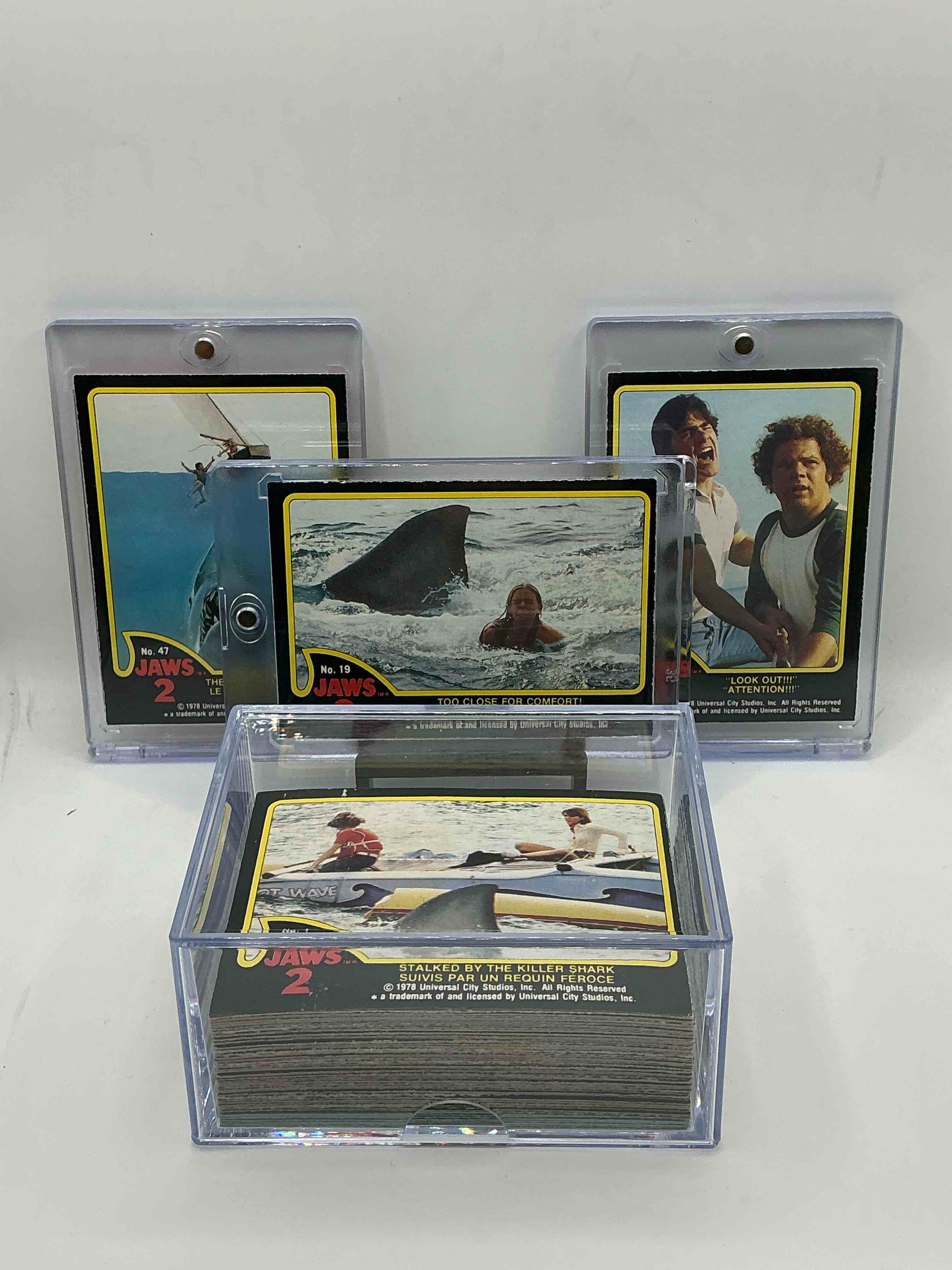 Product photo of 1978 jaws movie history!  authentic, original & complete 70 movie card & sticker set for jaws 2!  jaws 2 is the first jaws movie that made trading cards!  own a complete, genuine serious movie collectible!  in great condition,  ultra rare complete & in this condition!  