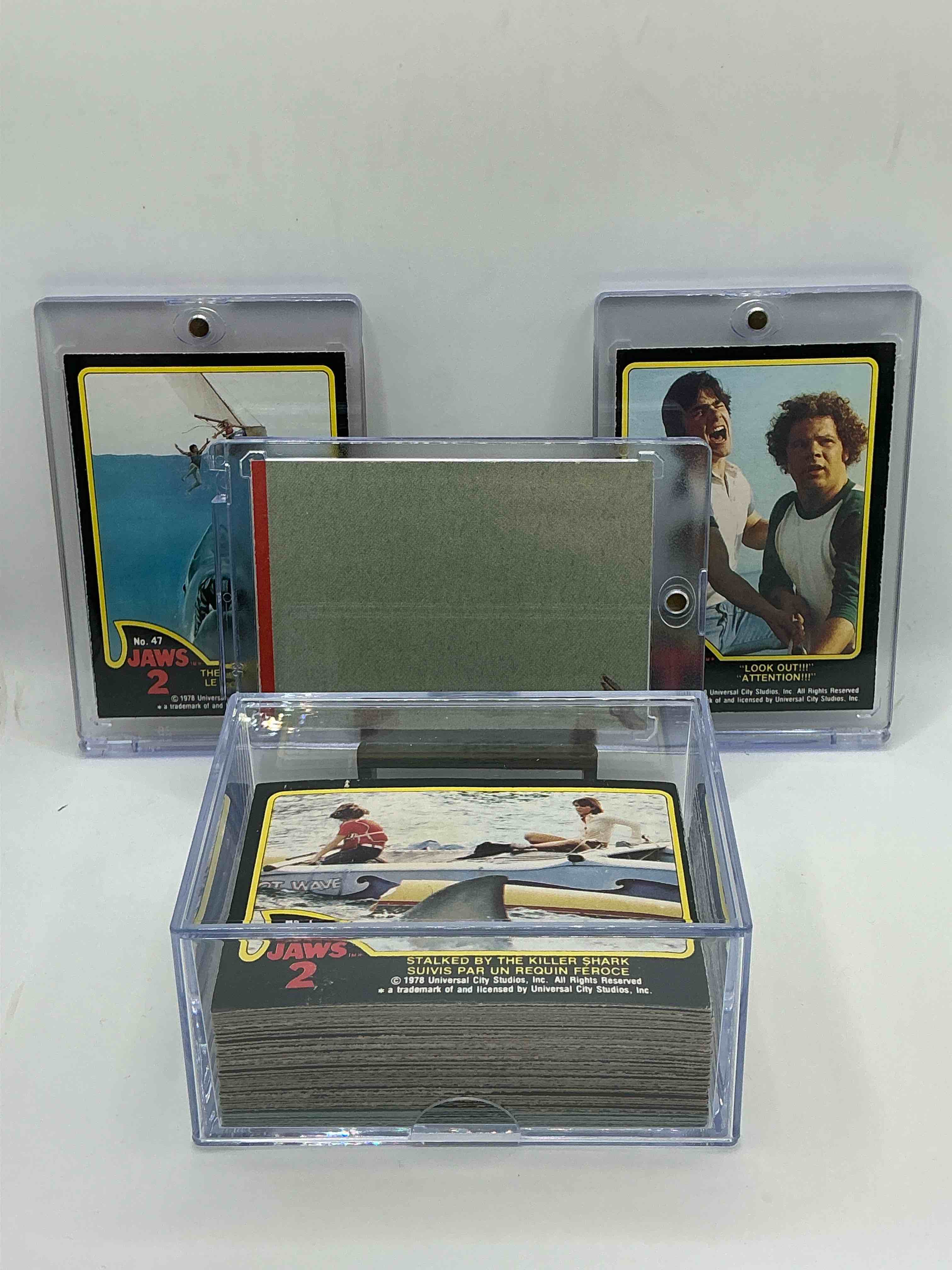Condition photo showing New/Like New for 1978 jaws movie history!  authentic, original & complete 70 movie card & sticker set for jaws 2!  jaws 2 is the first jaws movie that made trading cards!  own a complete, genuine serious movie collectible!  in great condition,  ultra rare complete & in this condition!  