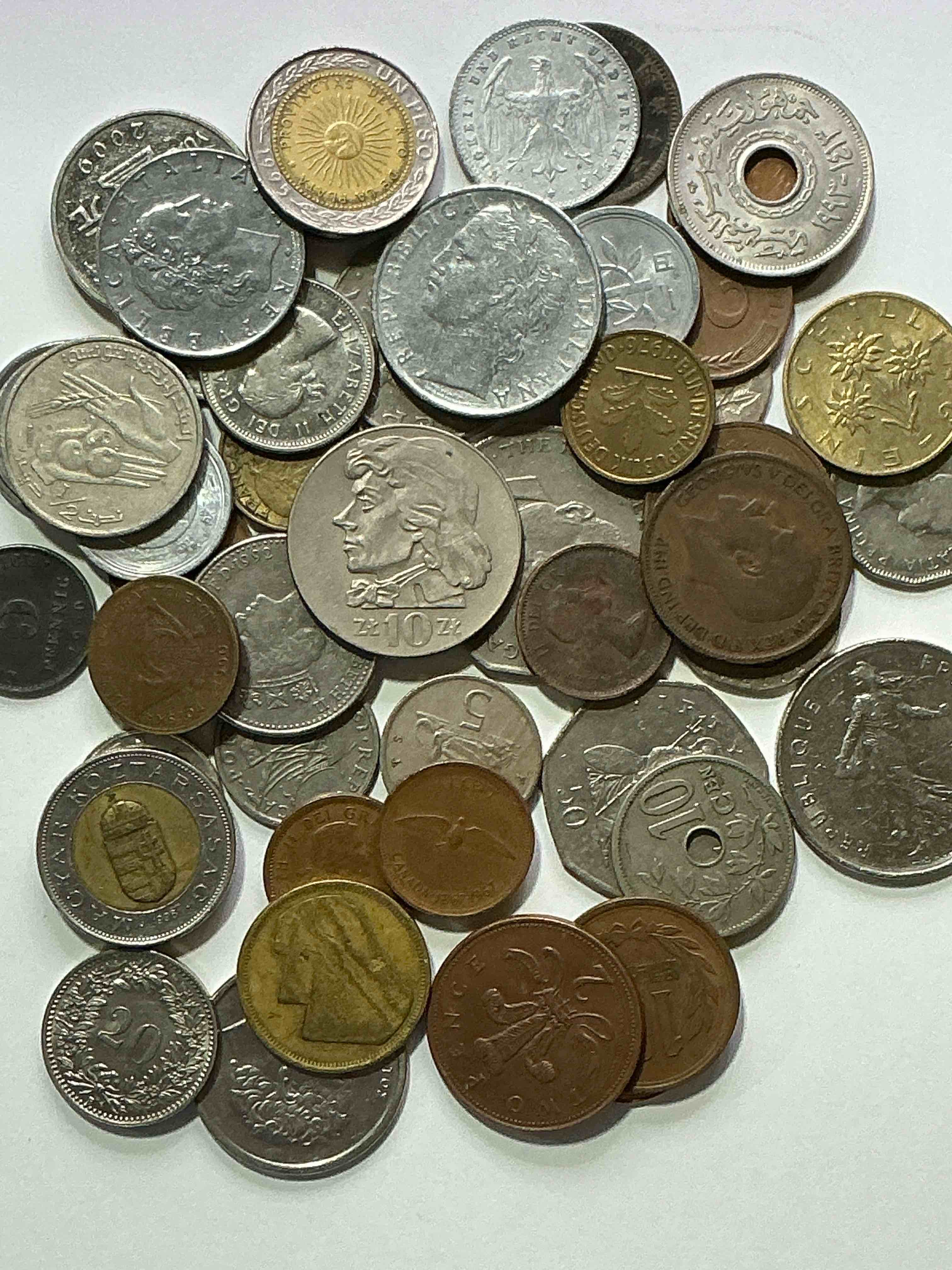 Condition photo showing Good Condition for world coins, antique & vintage! each lot is unique! many different years, countries, sizes & exotic places. this cool collection of antique coins from around the world is loads of fun! have fun identifying each coin & country as a great educational tool! a great investment too!