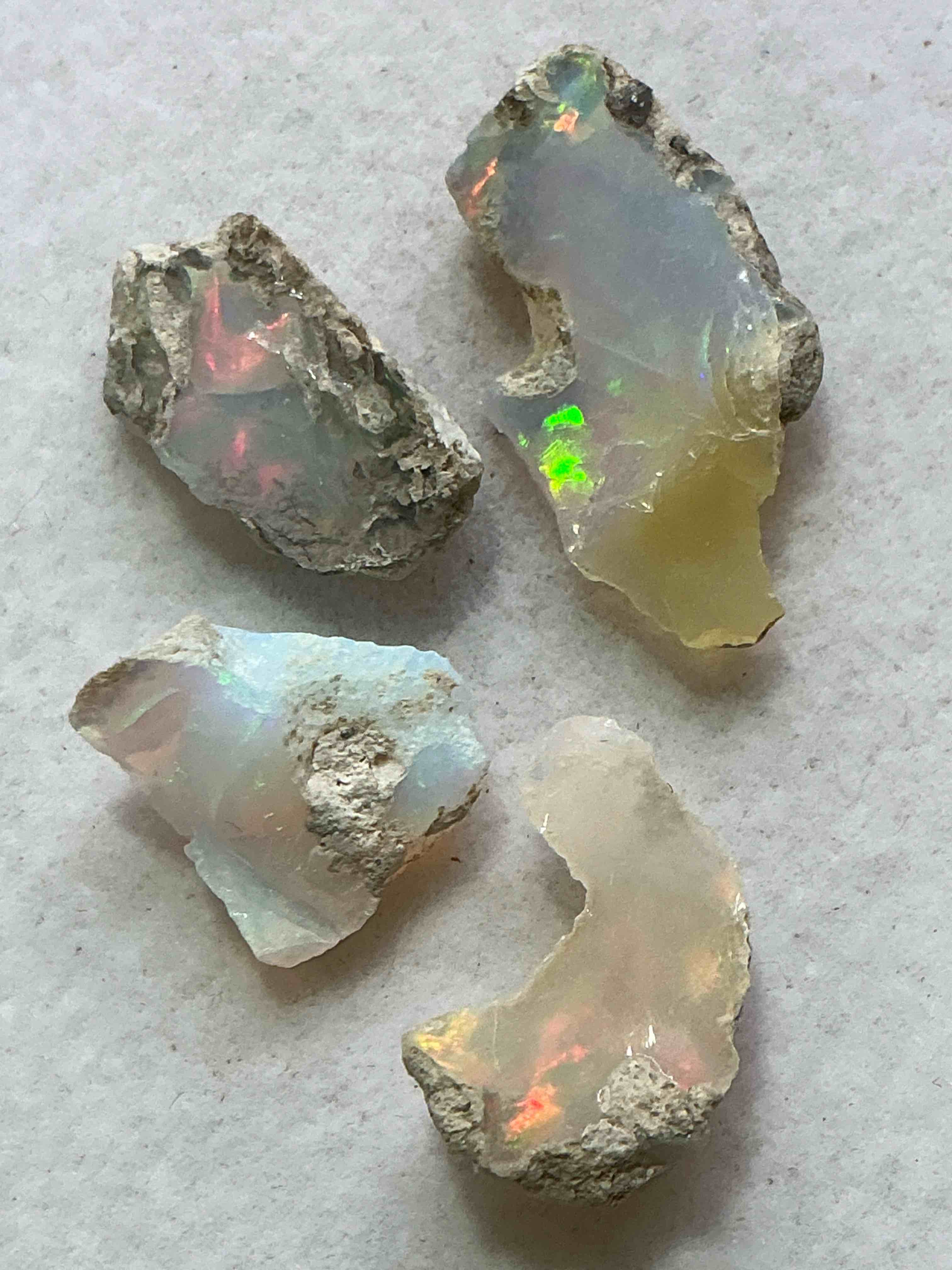 Opal Precious Gemstone, Raw, Authentic! Ethiopian Opal Gemstone, In Large & Raw, Prospected Form! Ethiopian Opals Are Famous For Their Stunning Clarity & Shimmering Color Hues! They Are Believed To Promote Hope, Purity & Love. The U.S. Dime In Image Is For Size Reference Only (Not Included). A Gemstone Like This In Raw Form Is Very Hard To Find! Own An Amazing, Stunning, Unique Opal Gemstone In Rare, Raw Form!