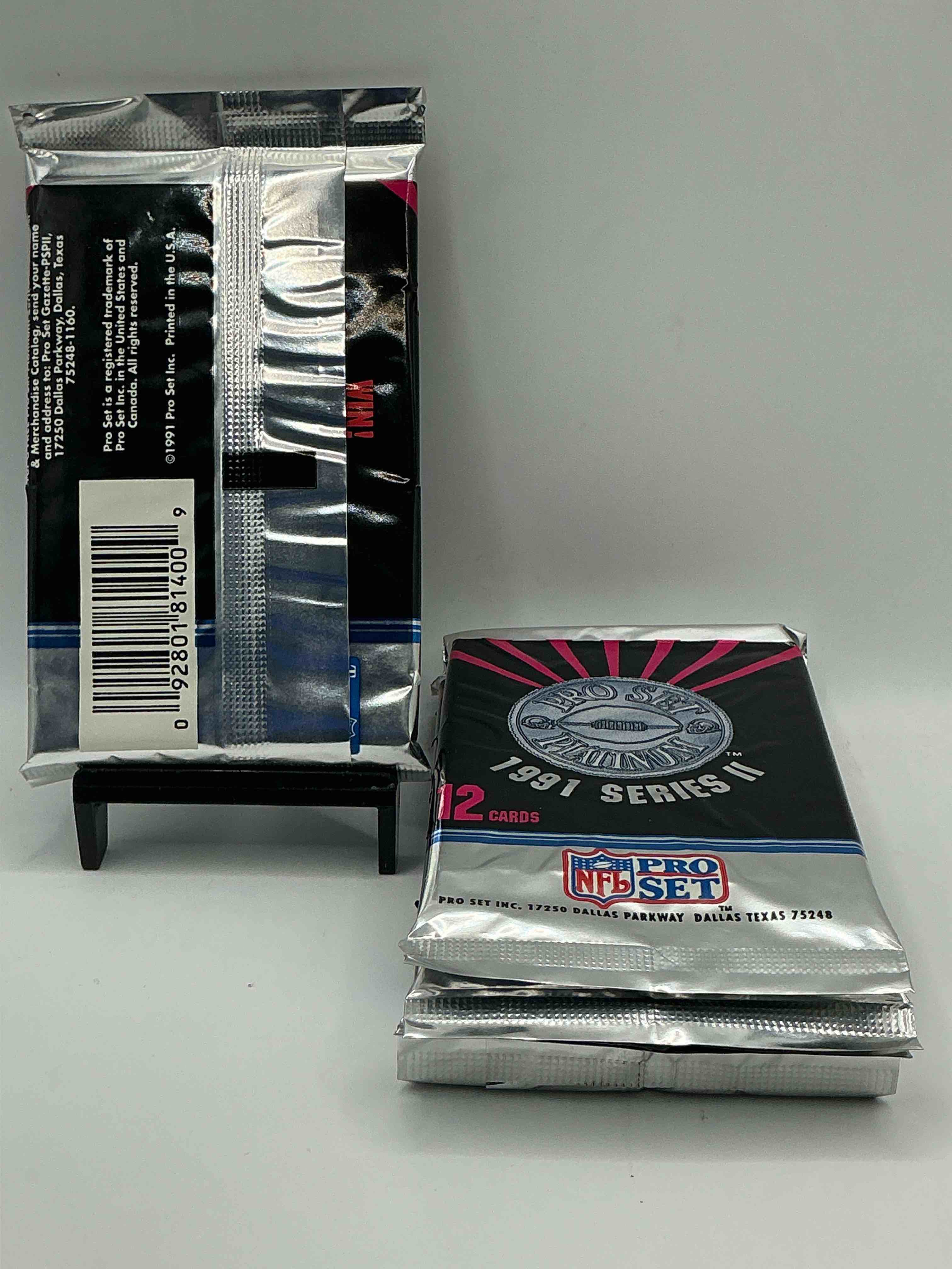 Condition photo showing New/Like New for 1991 pro set platinum edition series ii unopened packs! search for brett favre rookie & bill belichick coach rookie card as well as santa claus card!