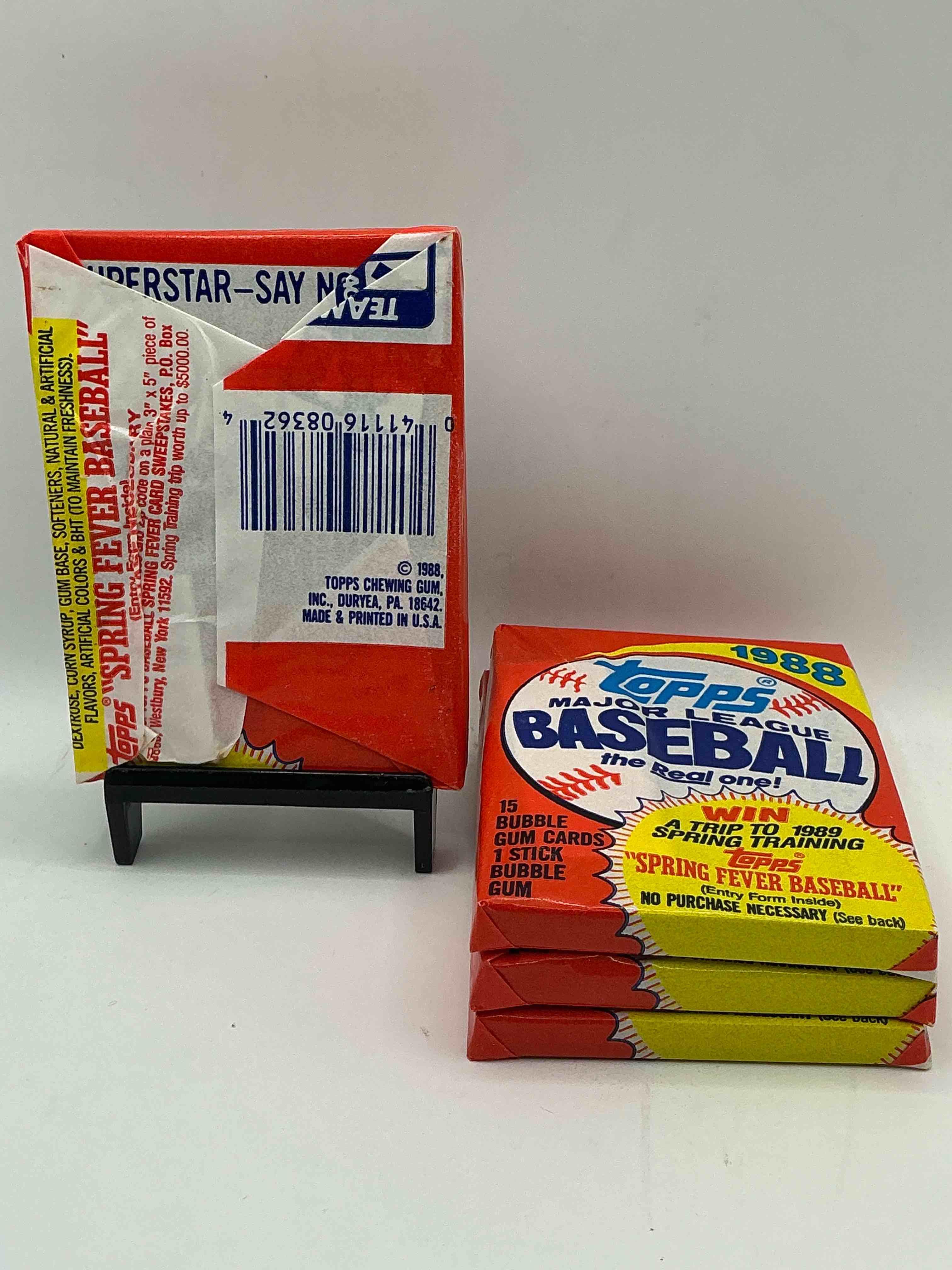 Condition photo showing New/Like New for 80's baseball fan's rejoice! 1988 topps baseball unopened wax packs full of collectible trading cards! search for valuable don mattingly "world of baseball" & nolan ryan cards worth hundreds in perfect condition!