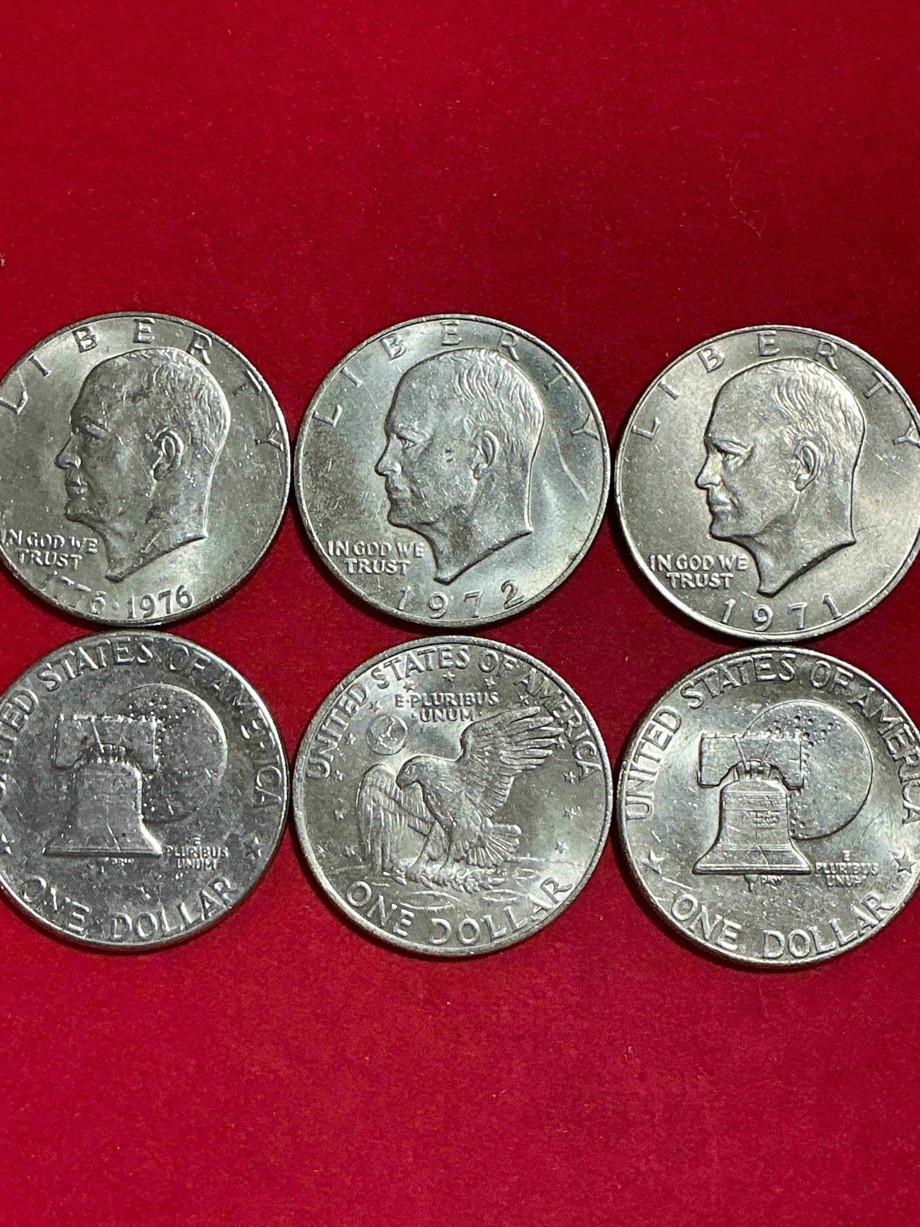 eisenhower dollars! here’s six circulated “ike” dollars! up for auction are ike one dollar coins from different years! 1976! awesome ike dollars!