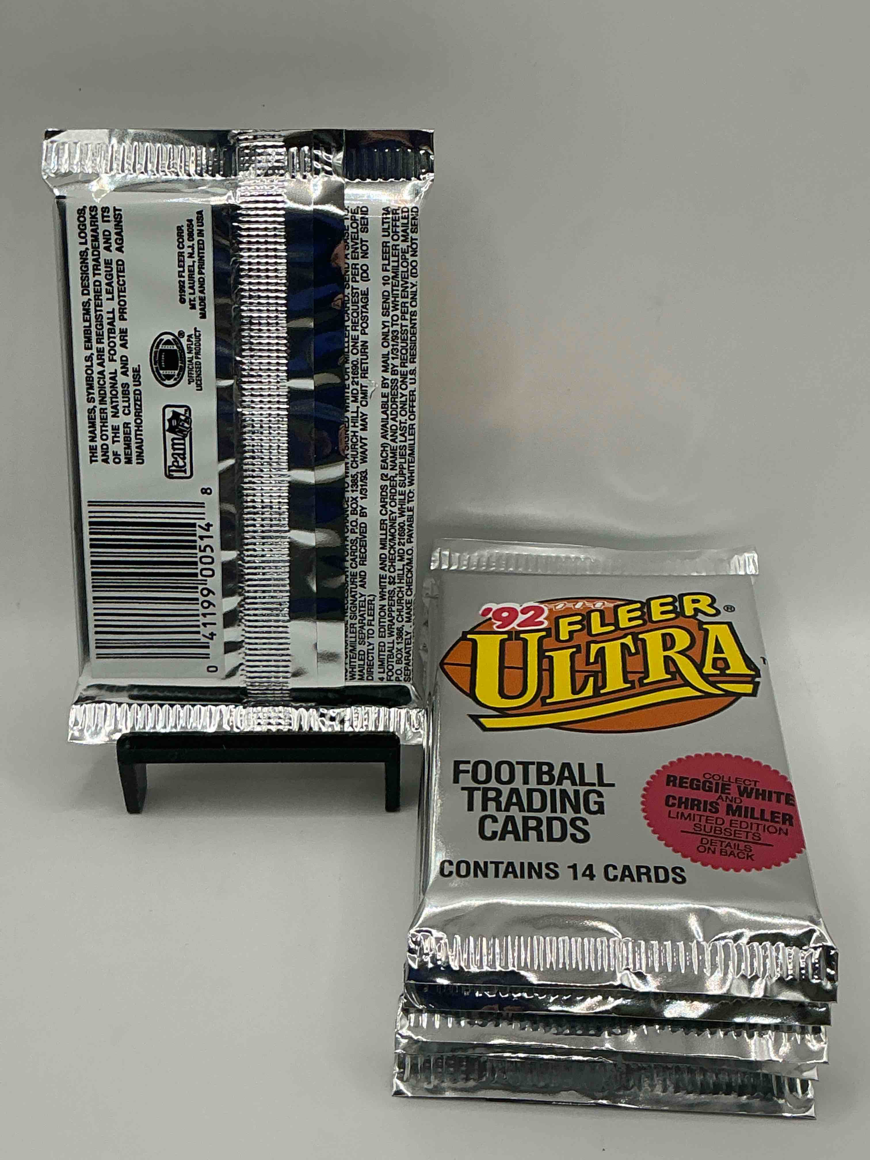 Condition photo showing New/Like New for 1992 fleer ultra football unopened packs, straight from box! search for awesome cards from barry sanders, emmitt smith, brett favre & other 80's & early 90's stars! also, search for mark rypien performance highlights cards!