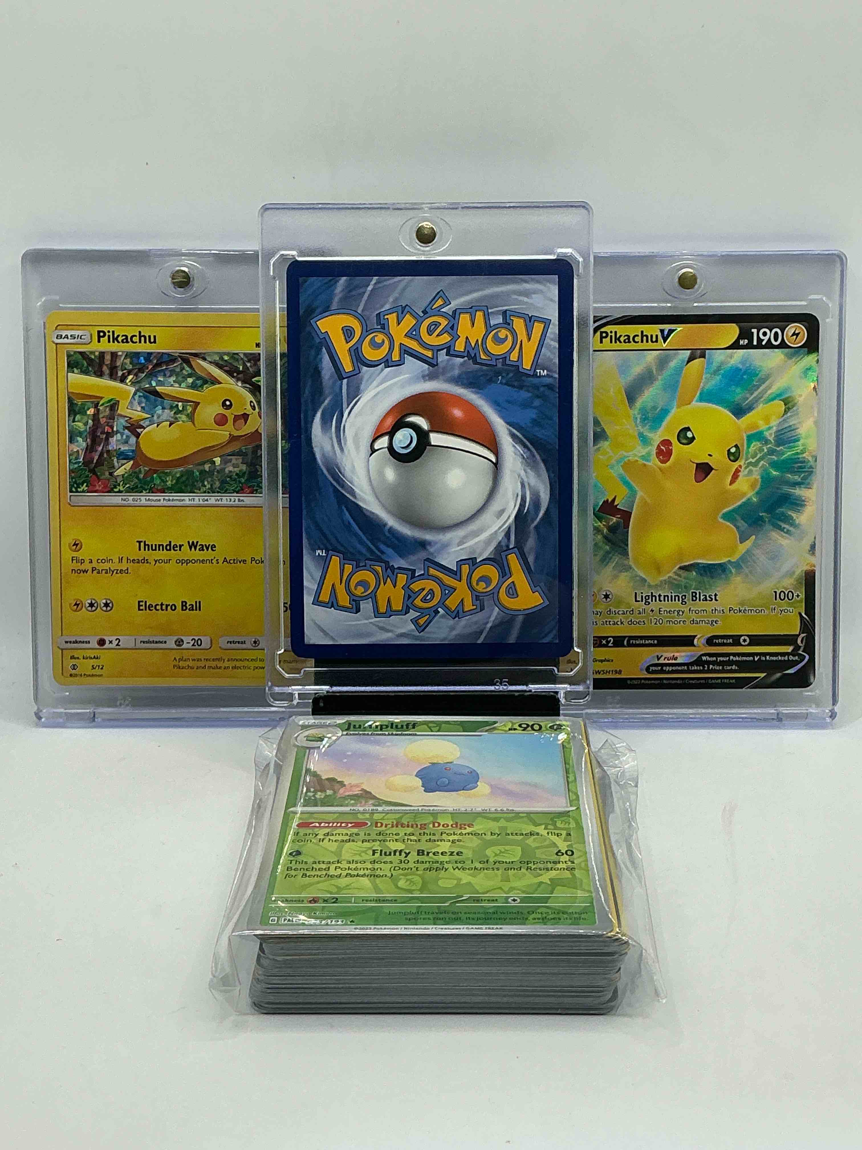Condition photo showing New/Like New for pokémon & pikachu party! surfing pikachu v! pikachu v! pokémon shimmer! along with 50 other pokémon heroes, holos, legends & commons- including 1 stage two rare holographic, 2 stage one rare holographic, 3 basic rare holographic, 4 common/ uncommon holographics (all stages), 2 stage two non holographic & 2 rares! also includes 36 non holo common/ uncommon basic & first stage cards trainers & energy too! perfect set for collectors & enthusiasts!