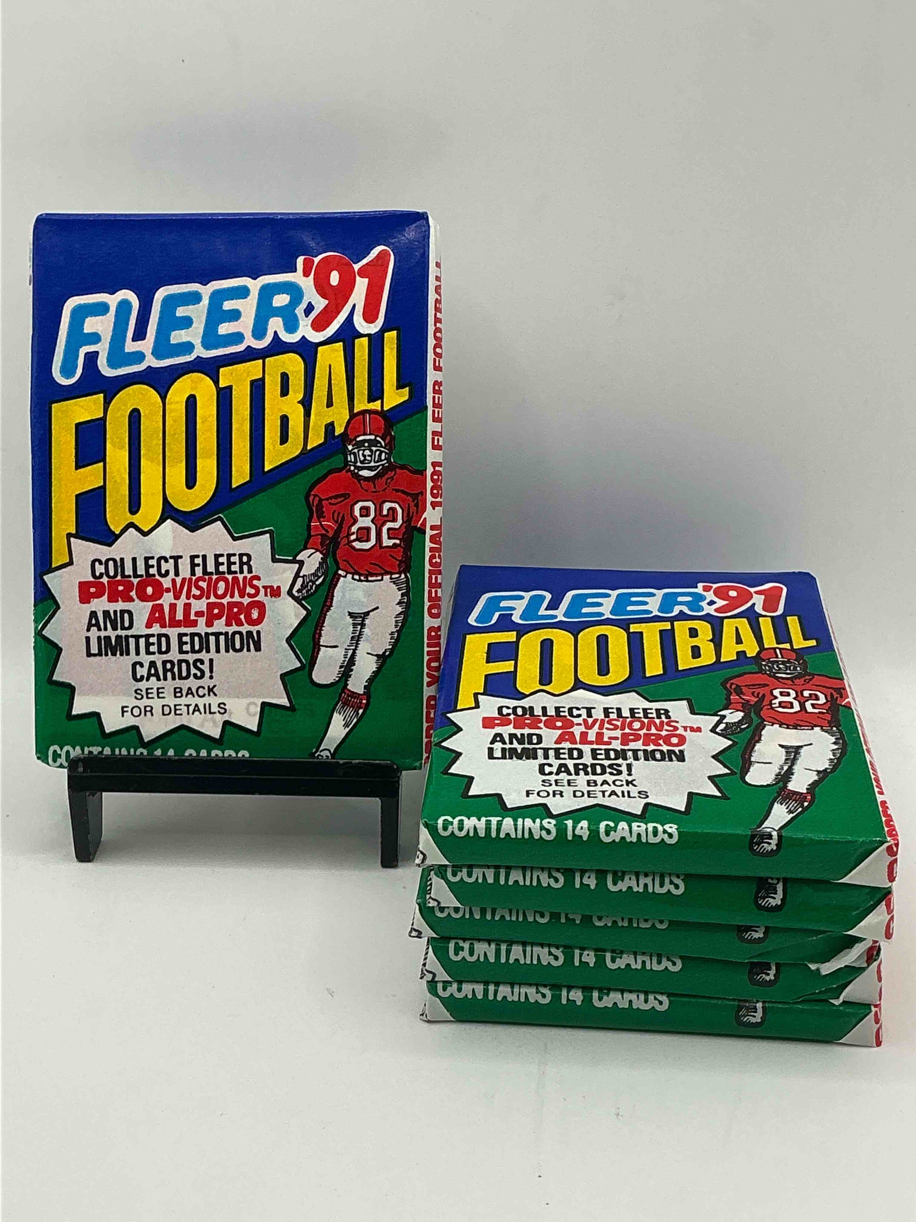 1991 fleer football unopened sports card wax pack, direct from original retail case. search for early barry sanders, emmitt smith, jerry rice & joe montana!