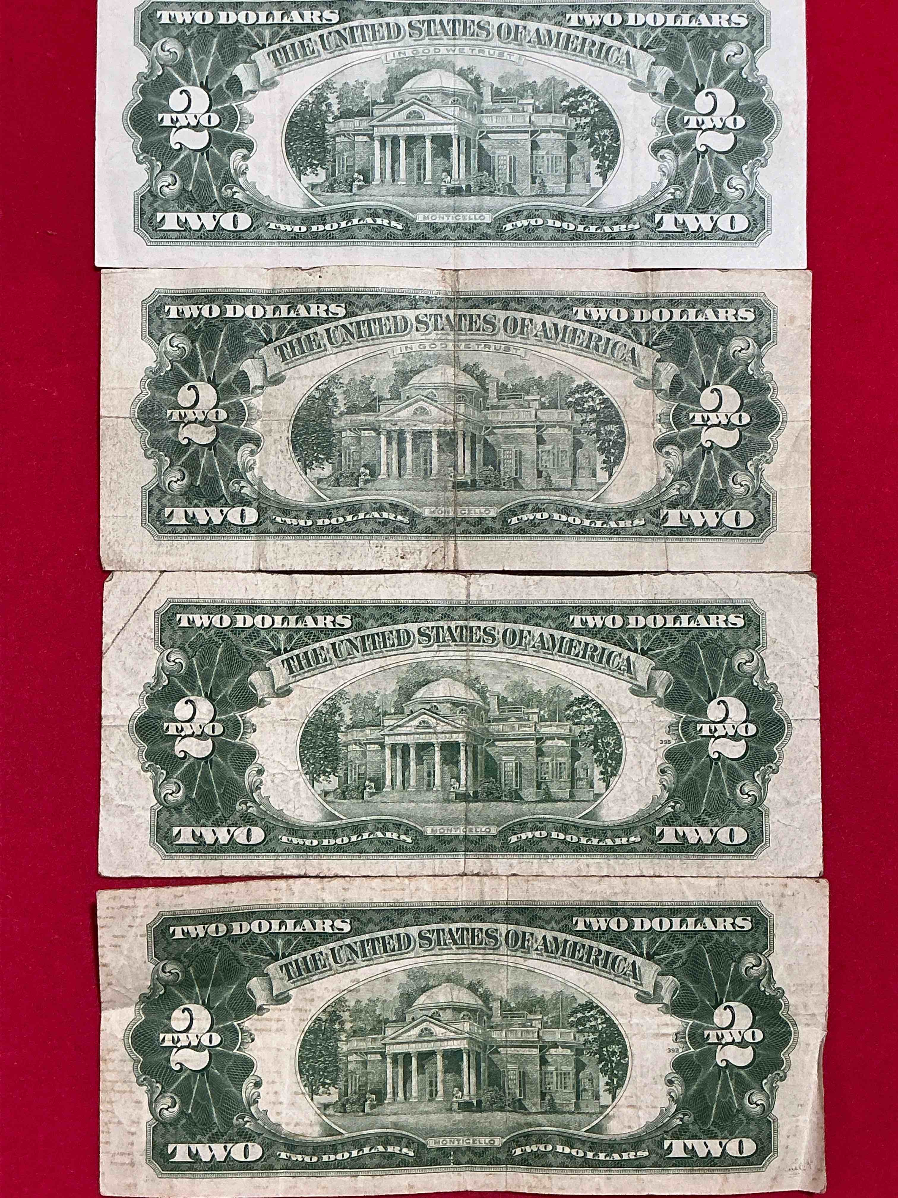 Condition photo showing Good Condition for rare red seal two dollar bills! 1953 & 1963 edition paper money! check out these rare bills, perfect addition to any collection!