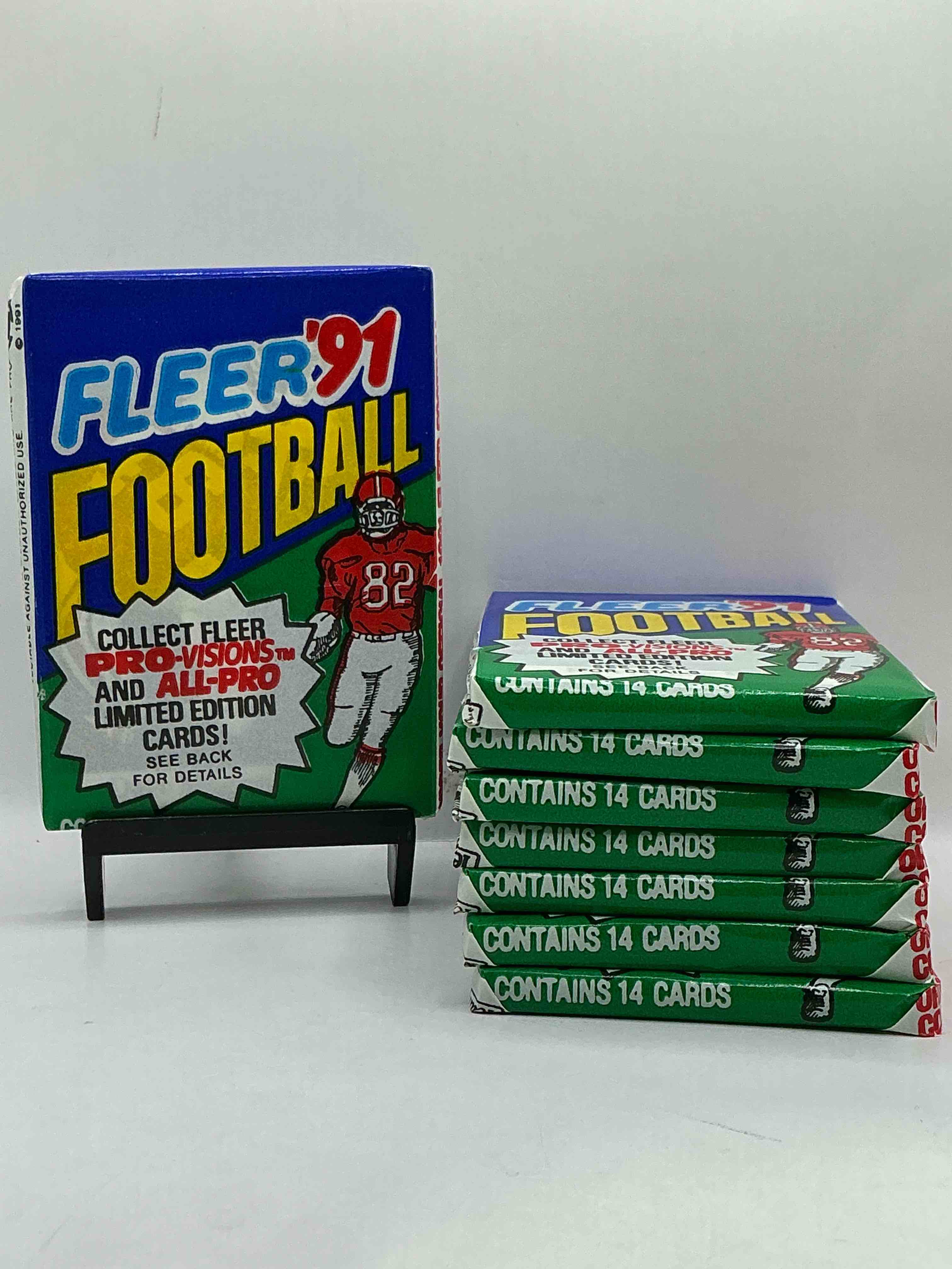 1991 fleer football unopened sports card wax pack, direct from original retail case. search for early barry sanders, emmitt smith, jerry rice & joe montana!