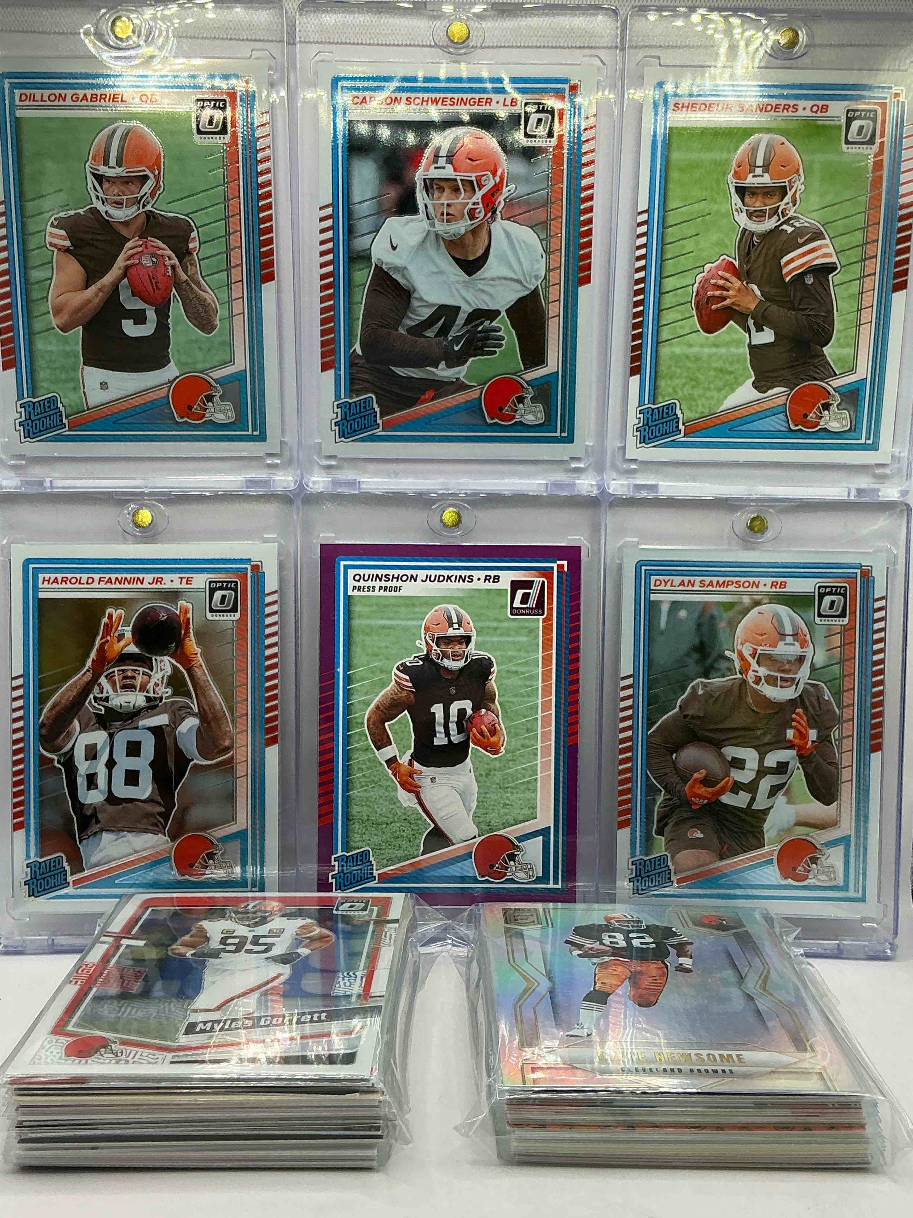 Condition photo showing New/Like New for browns bonanza! browns match! optic insanity, shedeur, gabriel, sampson, fannin, schwesinger, judkins & more! all rookies! vintage & new 50 card lot! browns insanity, cleveland browns 50 card lot!