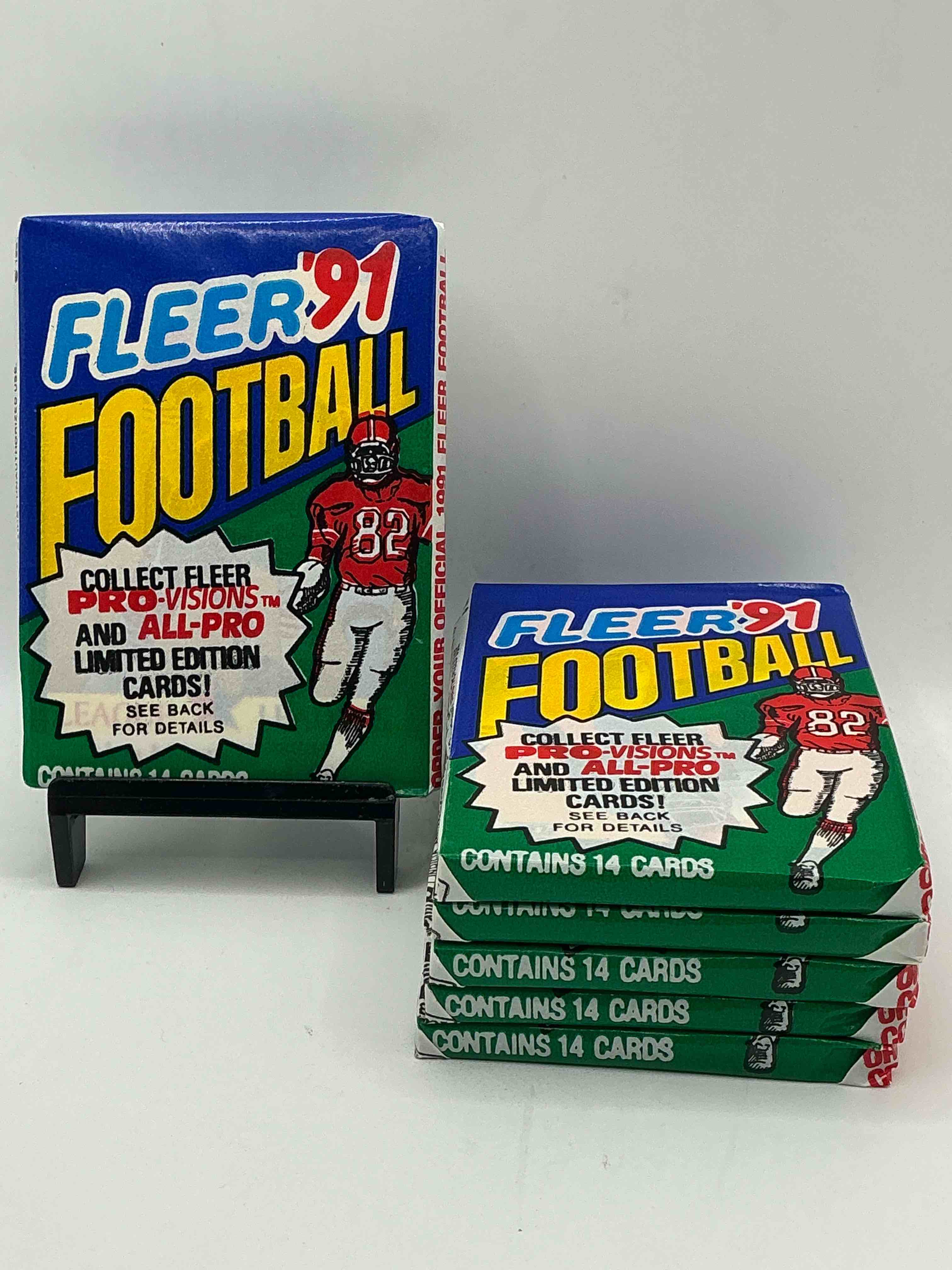 1991 fleer football unopened sports card wax pack, direct from original retail case. search for early barry sanders, emmitt smith, jerry rice & joe montana!