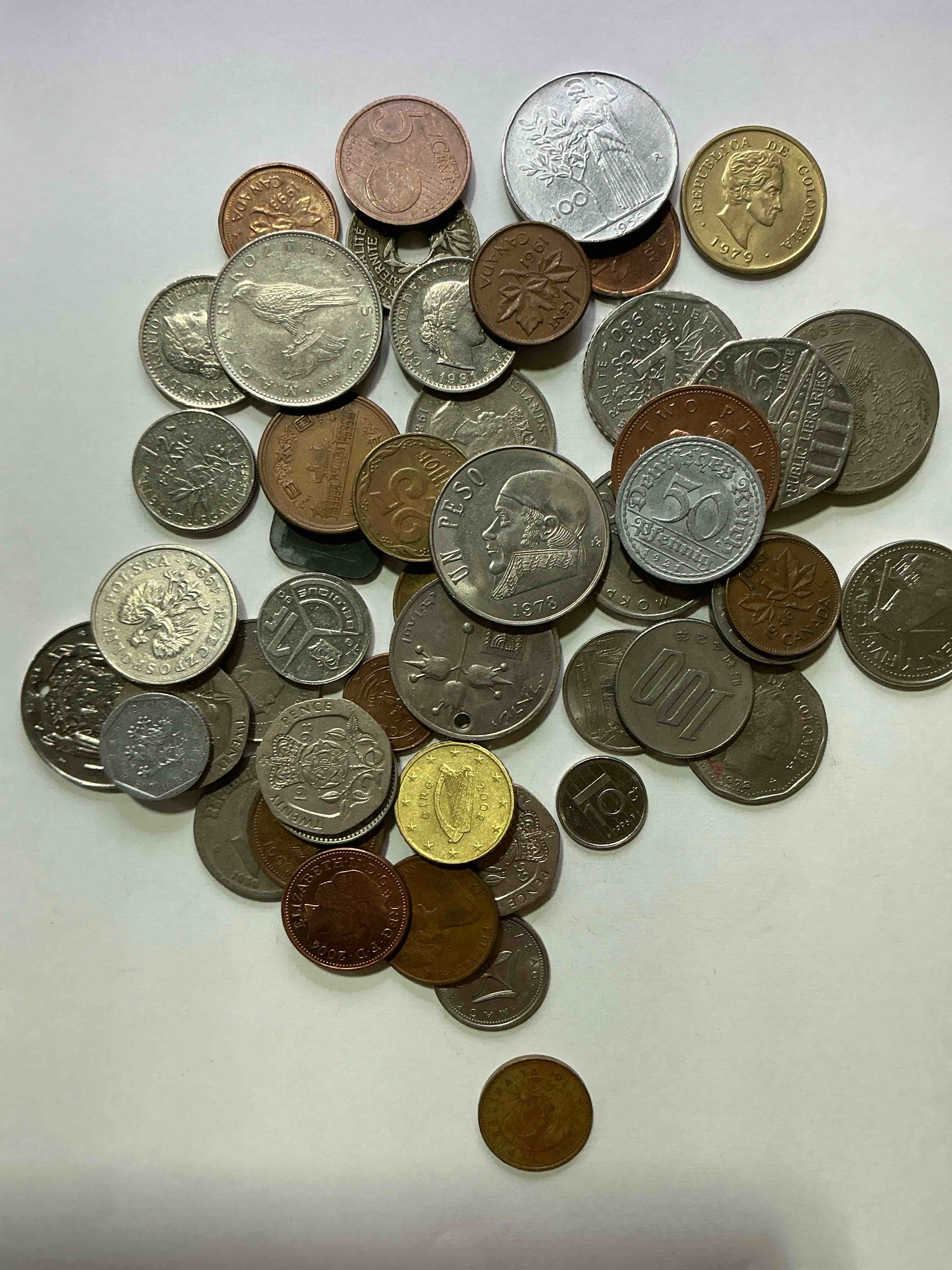 Condition photo showing Good Condition for world coins, antique & vintage! each lot is unique! many different years, countries, sizes & exotic places. this cool collection of antique coins from around the world is loads of fun! have fun identifying each coin & country as a great educational tool! a great investment too!
