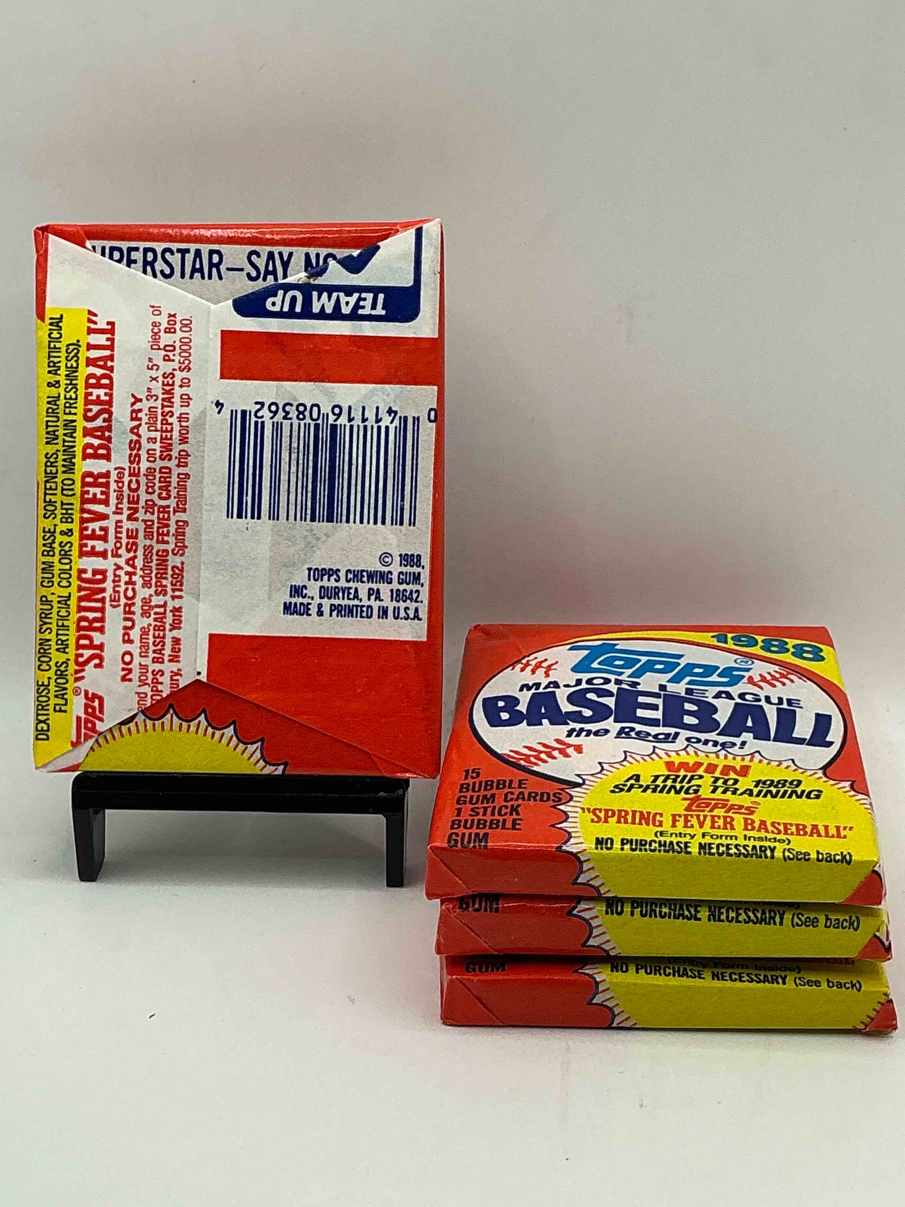 Condition photo showing New/Like New for 80's baseball fan's rejoice! 1988 topps baseball unopened wax packs full of collectible trading cards! search for valuable don mattingly "world of baseball" & nolan ryan cards worth hundreds in perfect condition!