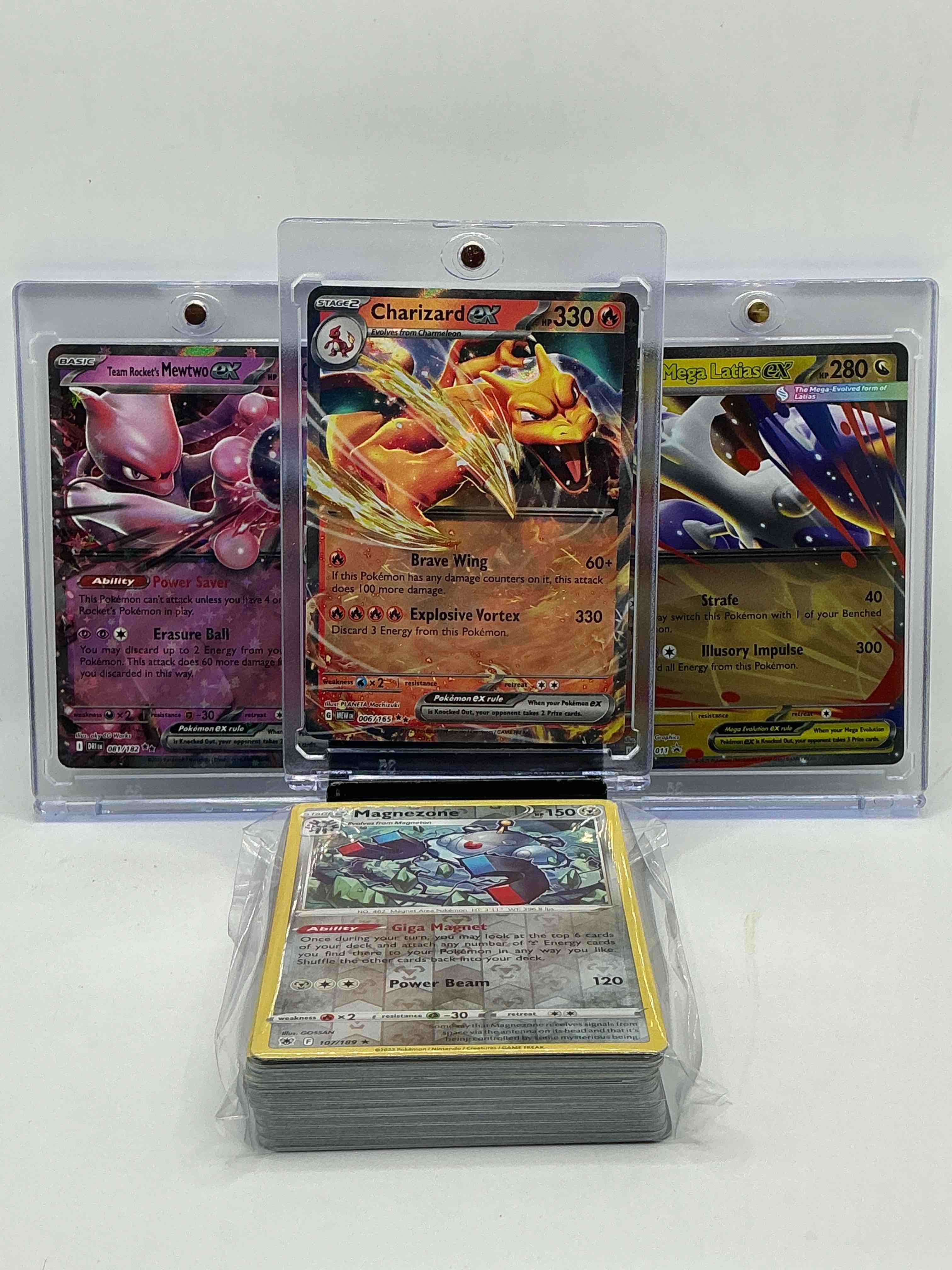 Pokémon Party! Charizard EX! Team Rocket’s Mewtwo EX! Mega Latias EX! Along With 50 Other Pokémon Heroes, Holos, Legends & Commons- Including 1 Stage Two Rare Holographic, 2 Stage One Rare Holographic, 3 Basic Rare Holographic, 4 Common/ Uncommon Holographics (All Stages), 2 Stage Two Non Holographic & 2 Rares! Also Includes 36 Non Holo Common/ Uncommon Basic & First Stage Cards Trainers & Energy Too! Perfect Set For Collectors & Enthusiasts!