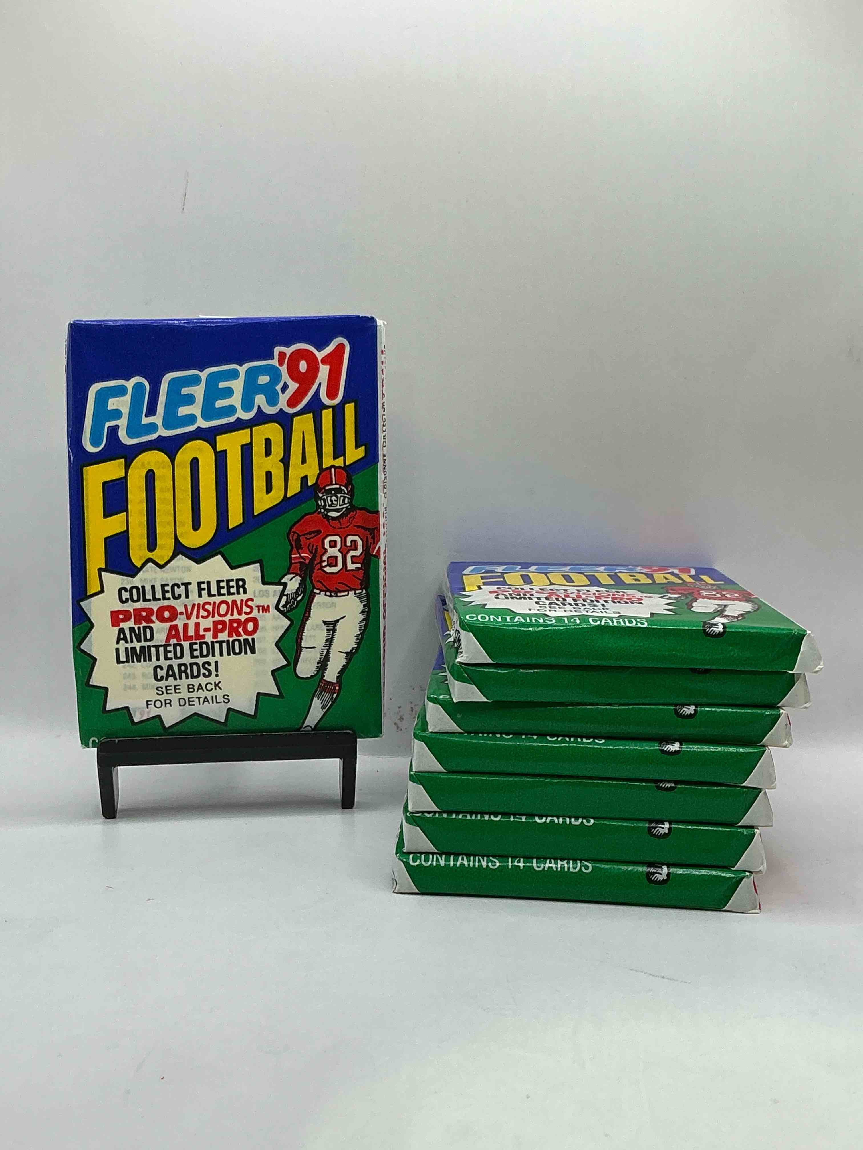 1991 fleer football unopened sports card wax pack, direct from original retail case. search for early barry sanders, emmitt smith, jerry rice & joe montana!