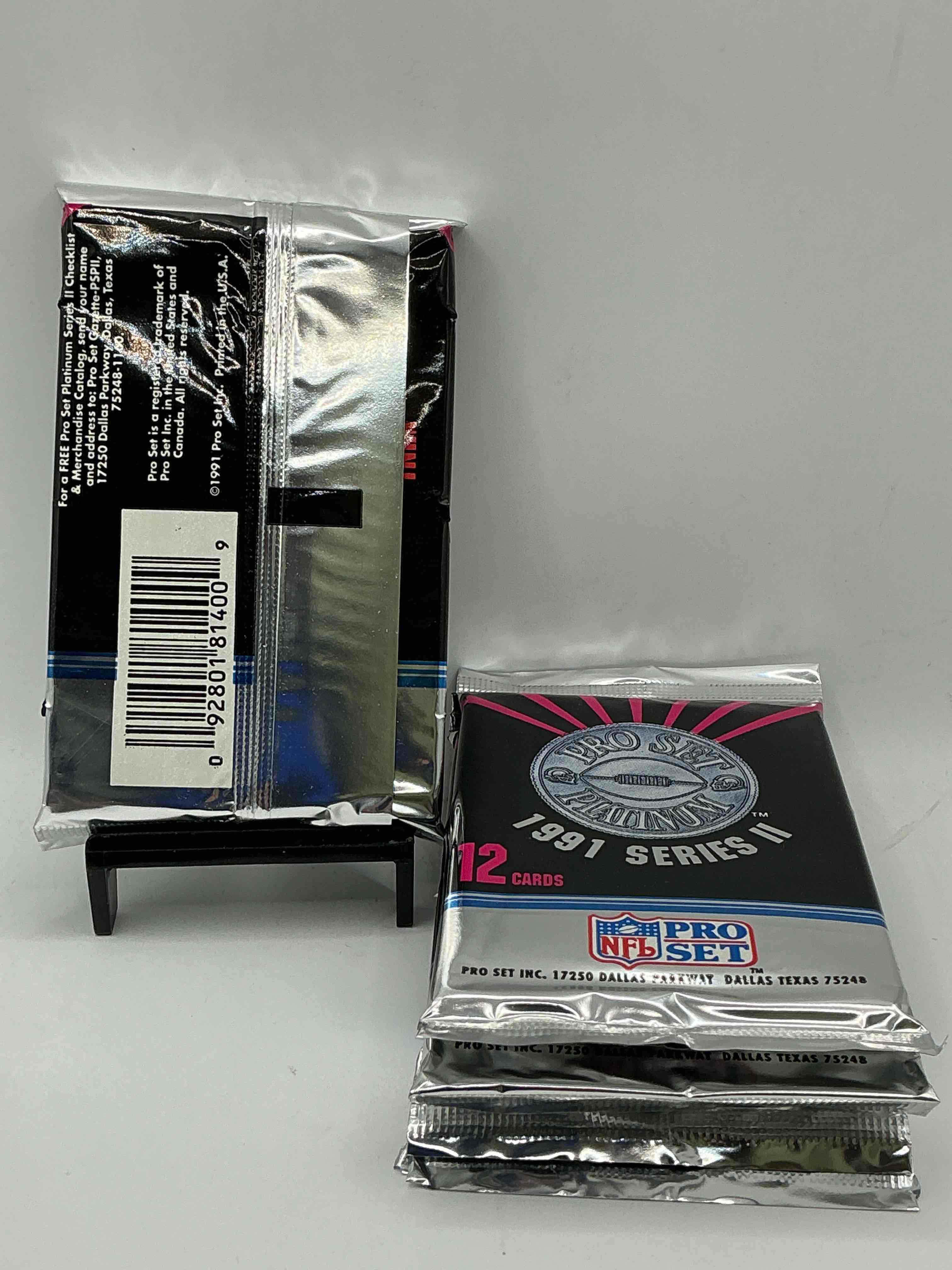 Condition photo showing New/Like New for 1991 pro set platinum edition series ii unopened packs! search for brett favre rookie & bill belichick coach rookie card as well as santa claus card!