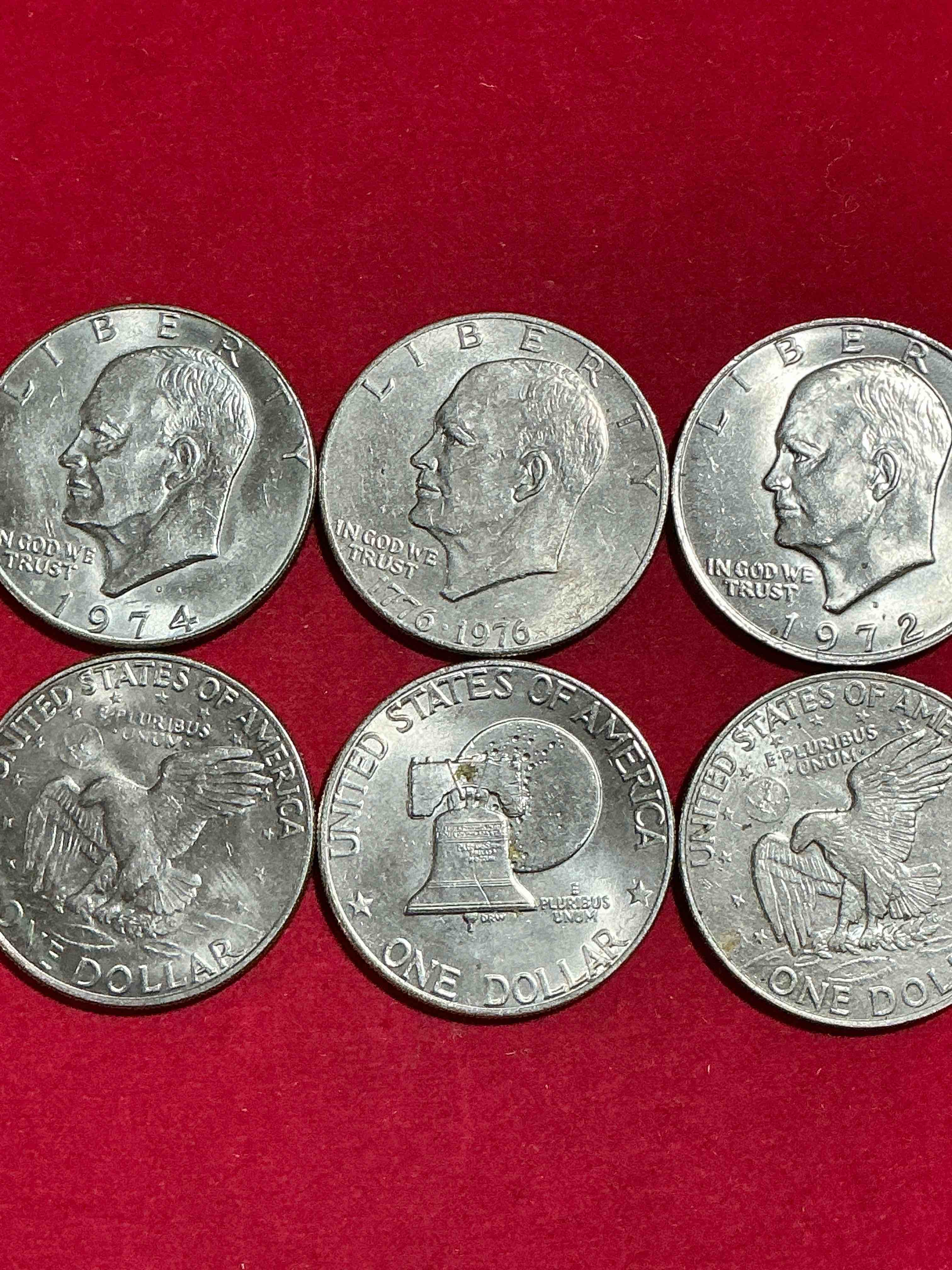 eisenhower dollars! here’s six circulated “ike” dollars! up for auction are ike one dollar coins from different years! 1976! awesome ike dollars!