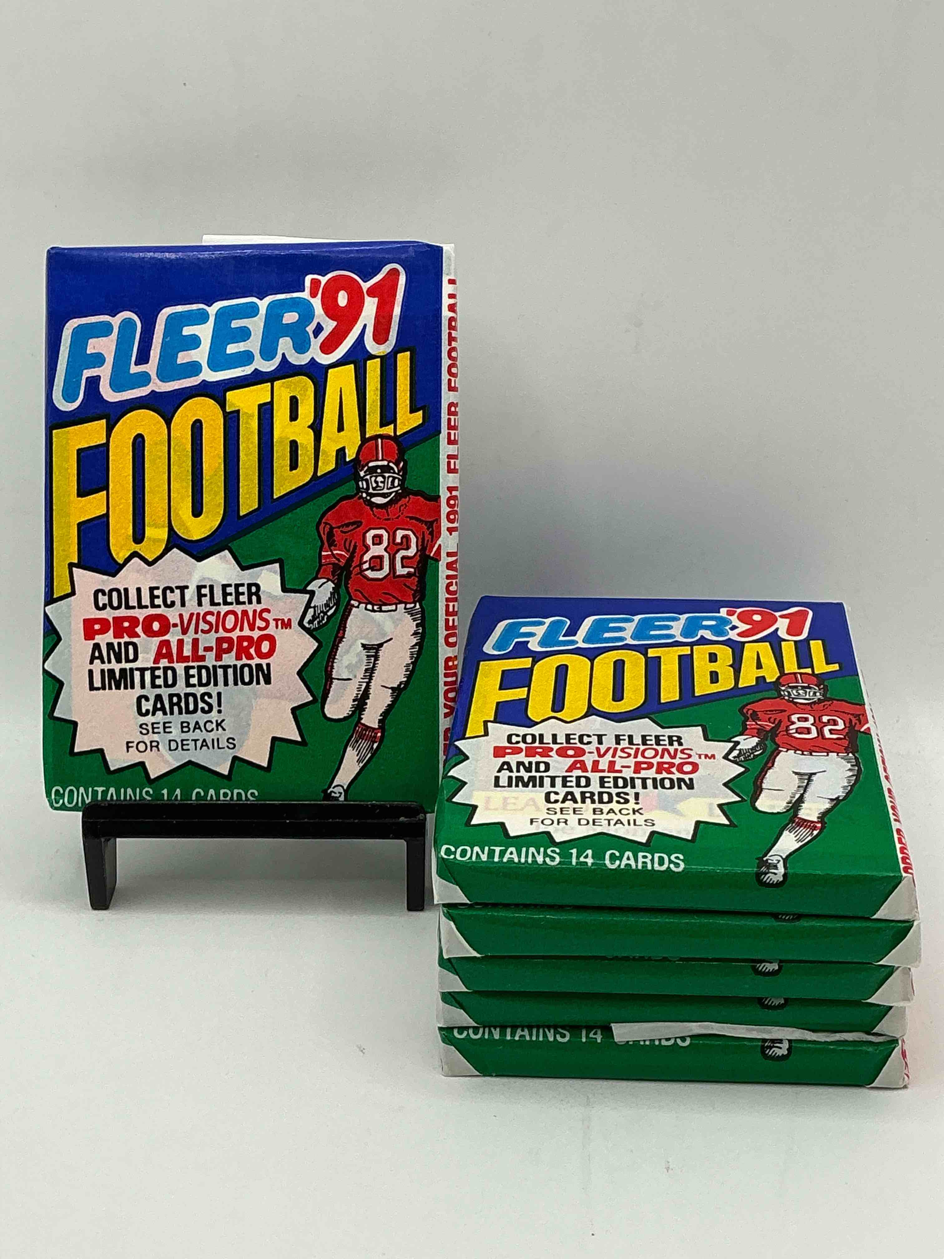 1991 fleer football unopened sports card wax pack, direct from original retail case. search for early barry sanders, emmitt smith, jerry rice & joe montana!
